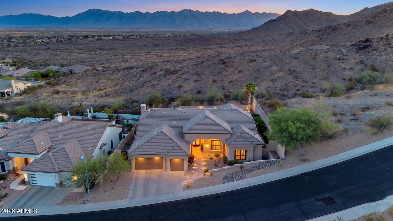 Homes like this don't come along very often.  Located in gated Montana Vista, this original-owner, single-level home sits on a culdesac & backs to preserve-absolutely stunning! Mesmerizing panoramic views of South Mountain from both front & back. Completely remodeled gourmet kitchen w/sub zero fridge, WOLF gas cooktop, 10 ft island, expansive cabinetry w/all the bells & whistles, quartzite counters, floating shelves & other decorator touches. Entertaining is a breeze w/custom wet bar, wine & beverage refrigerators, open floor plan & 12 ft ceilings throughout. Updated primary bath & all secondary beds have walk-in closets. Built in BBQ, pool w/water & fire feature, hot tub, HUGE covered patio w/electric sun screens & low maintenance yard. Access to all the fun amenities at Club West to0!