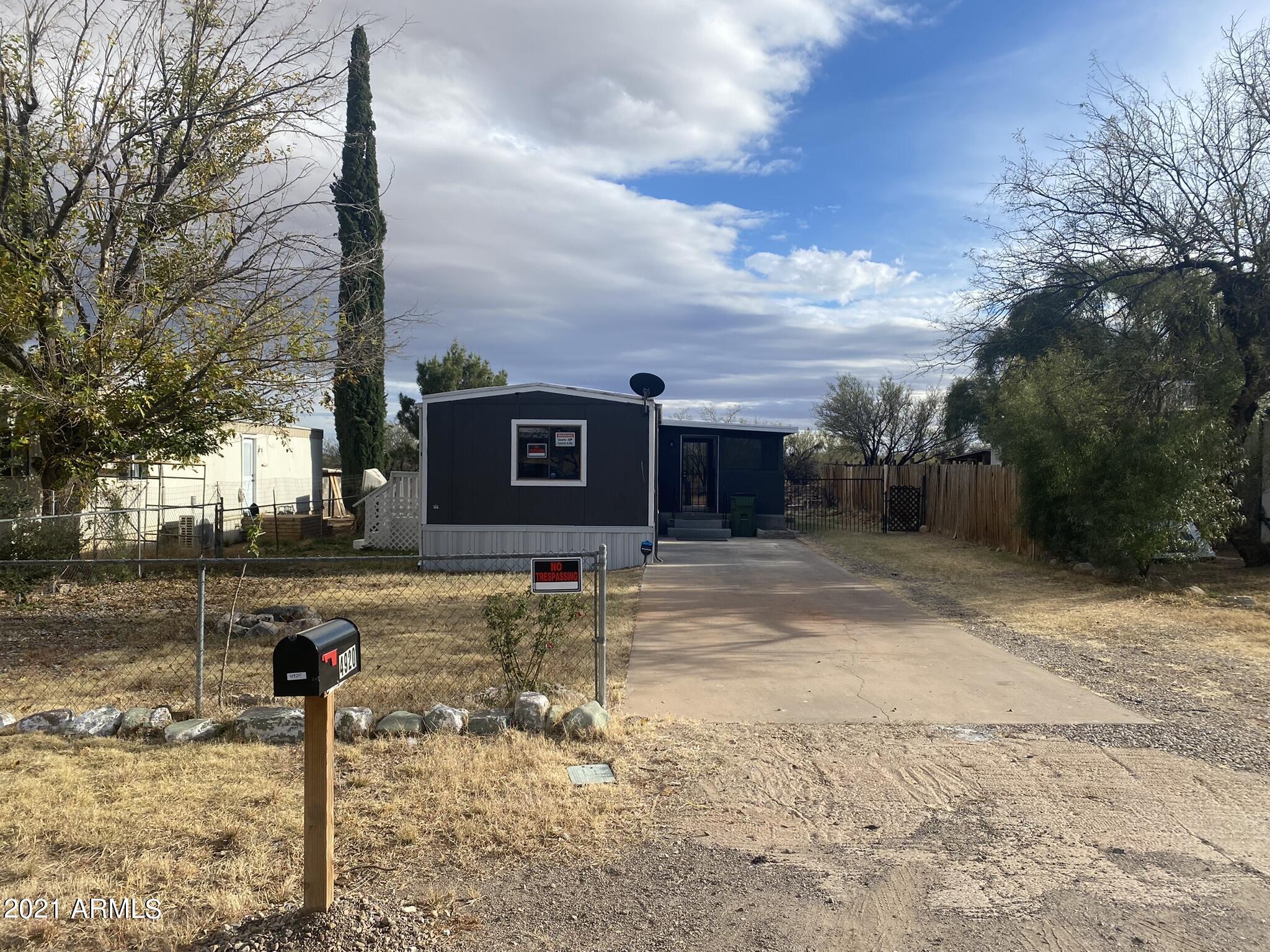 2 bedroom 1 bath single wide manufactured home with AZ room is beautifully remodeled with nice wood laminate flooring, fresh paint, new bathroom shower/tub combo and vanity!!
backyard has artificial grass area, firepit area and storage shed !!
Cash only due to home being moved to this lot in 2019
Call today for your private viewing