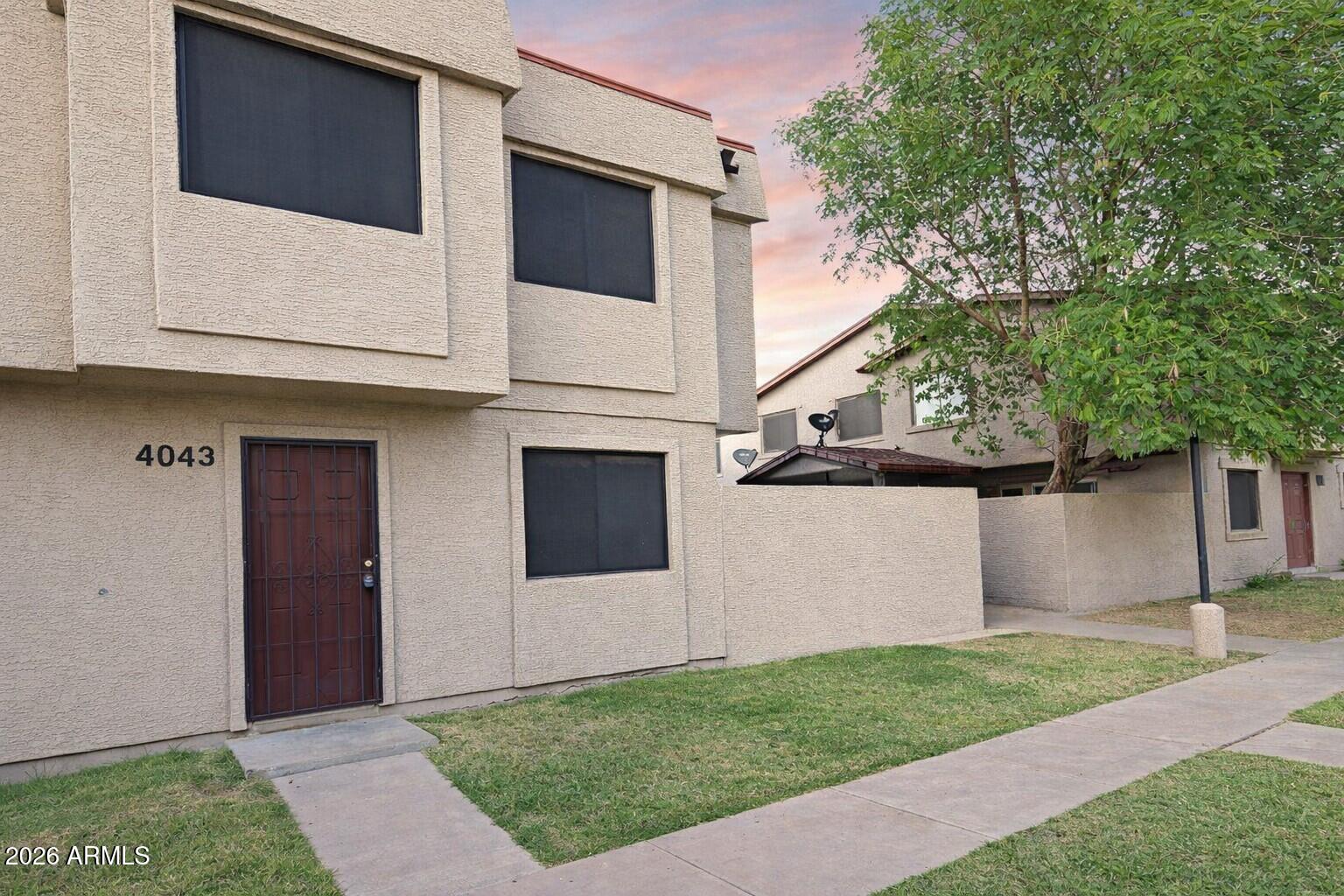 GREAT INVESTMENT OPPORTUNITY - OR A GREAT VALUE TO MAKE IT YOUR VERY OWN!!! What a fantastic opportunity for both investors and owner-occupants alike! This spacious 3-bedroom townhome is ideally located near Grand Canyon University, with convenient access to shopping, dining, major freeways, and just a short 20-minute drive to Sky Harbor Airport.
The thoughtfully designed layout features all three bedrooms upstairs, along with a full bathroom, creating a comfortable & functional living space. Downstairs offers an inviting living area, dining space, and an UPDATED & well-appointed kitchen complete with a generously sized walk-in pantry.  All windows are NEW, offering better insulation & greater energy efficiency.
Enjoy a private outdoor patio with additional storage, perfect for relaxing relaxing or entertaining. Ideally situated next to an open grassy area, this home offers added space and a peaceful setting. It comes with TWO assigned parking spots.  Whether you're looking to generate rental income or create a place to call your own, this property offers exceptional value and potential.