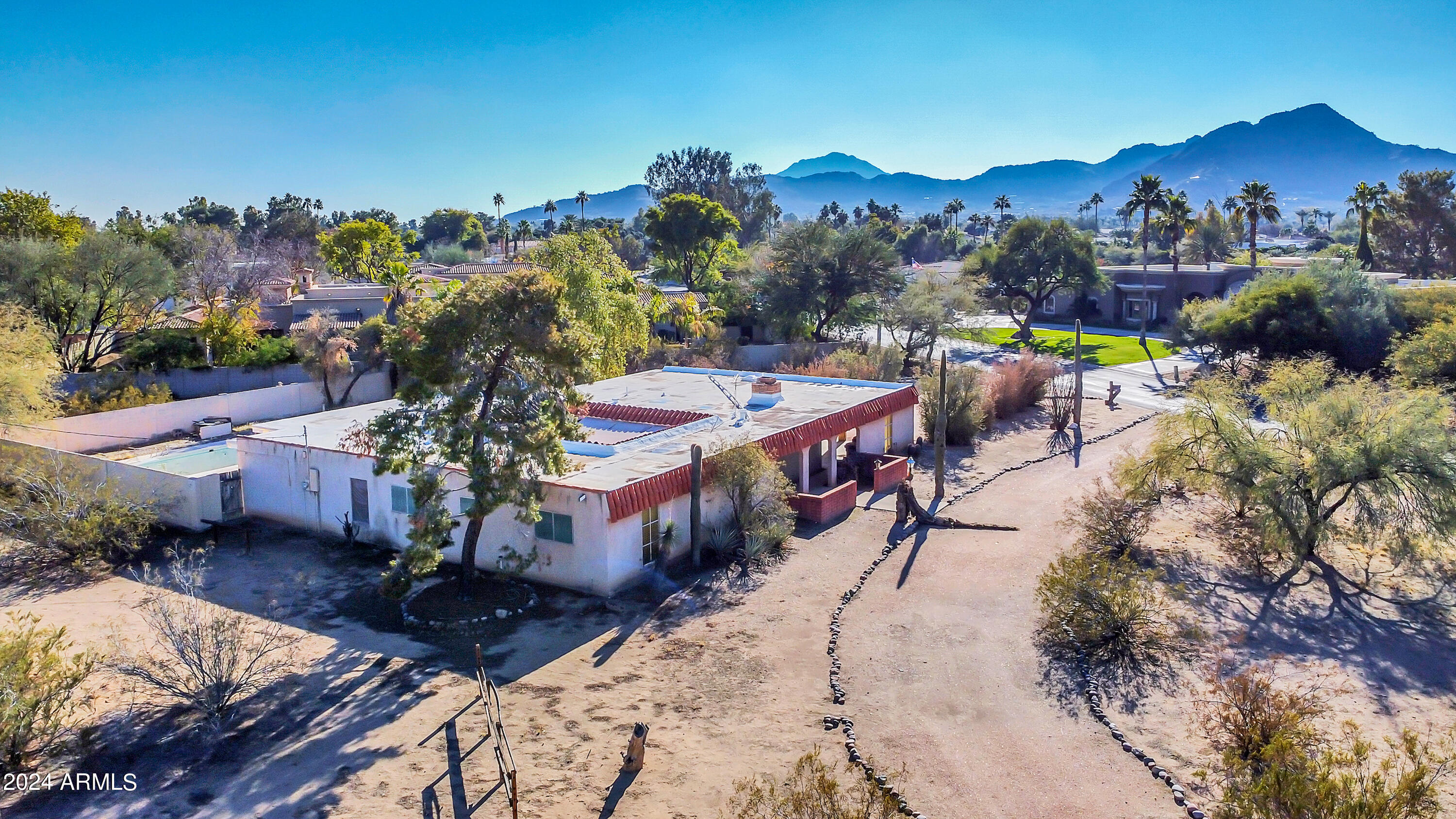 Welcome to Paradise Valley! This stunning lot offers the perfect combination of natural beauty and convenience for your luxurious dream home. Situated in a prime location , this corner lot boasts mountain views to the southwest, allowing you to wake up to stunning sunsets and enjoy the serene beauty of the surrounding landscape.
One of the standout features of this lot is its flat terrain, and north/south exposure, providing an ideal canvas for an easy and seamless building process. The location is superb close to Scottsdale, Gainey Ranch, world class shopping and dining! Value is in the land. See lot listing #6648617.
