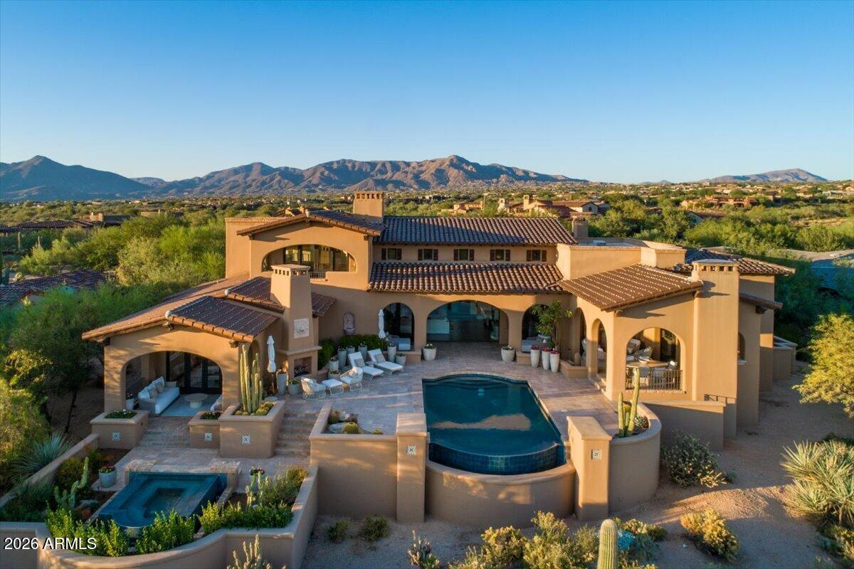 **A GOLF MEMBERSHIP is available depending on offer terms.**

An exceptional opportunity in Mirabel, this stunning residence is perfectly positioned on one of the community's most desirable lots, offering sweeping views of the golf course and valley beyond. Enjoy unforgettable sunsets and sparkling city lights from multiple covered outdoor living areas or while relaxing beside the beautiful pool. The home has been extensively renovated, including the kitchens in both the main house and casita, the luxurious primary bathroom, and the casita/media room and pool bathrooms. Additional upgrades include new wood flooring throughout, a new front door, new garage door motors and springs, a new roof installed in 2020, a new driveway, and updated window coverings--just to name a few. Thought fully designed with remarkable attention to detail and impeccably maintained, this property offers a rare blend of elegance, comfort, and breathtaking surroundings. A true standout in Mirabel, this home is a must-see for discerning buyers.