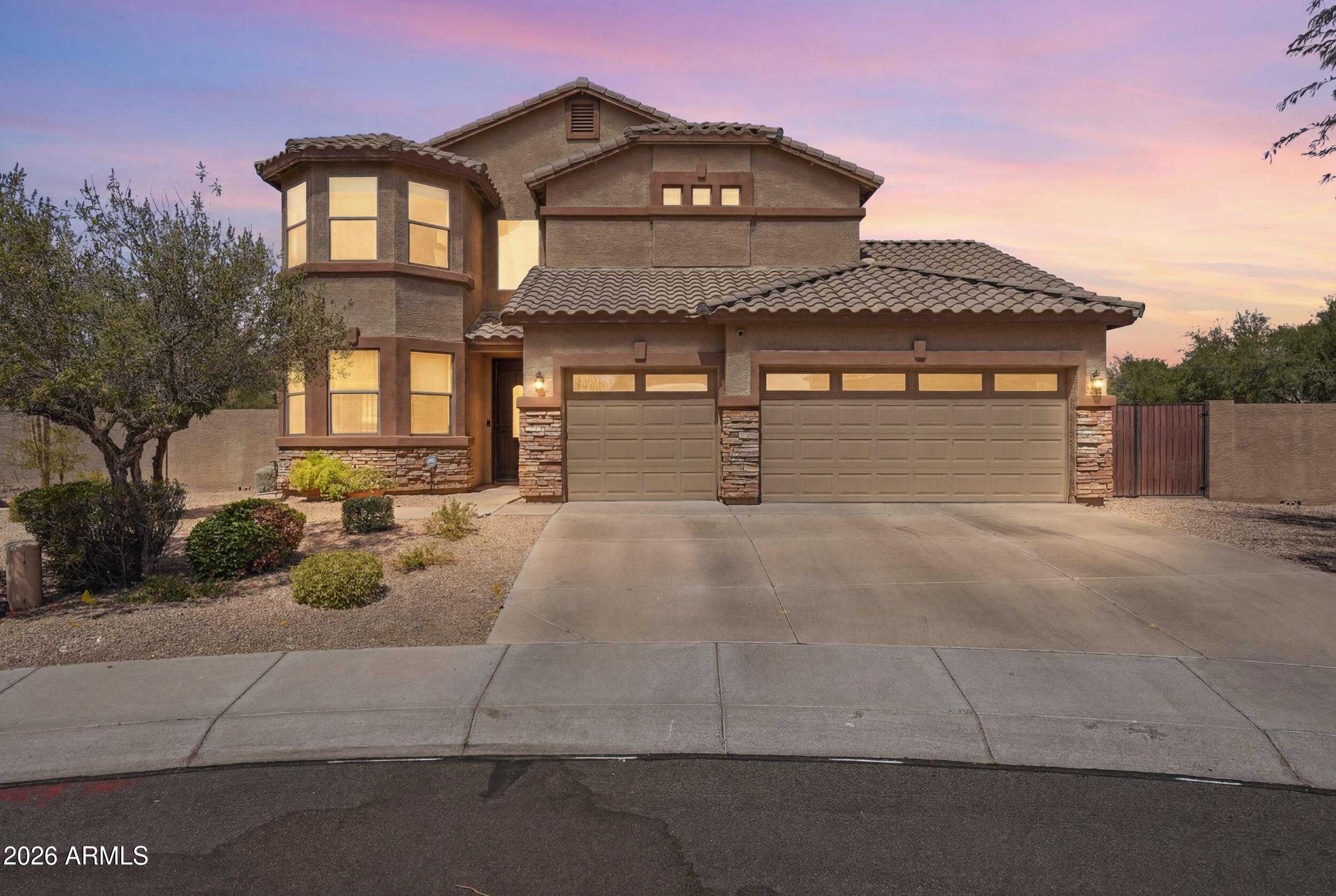 Welcome to this stunning 5-bedroom, 3 full bathroom home tucked away on a quiet cul-de-sac at the end of the street, offering privacy and an oversized lot that spans more than a quarter acre. Thoughtfully updated and designed for both everyday living and entertaining, this home features owned solar, soaring ceilings, and updated tile flooring throughout the downstairs, creating a bright, open feel from the moment you enter. The spacious kitchen is anchored by beautiful quartz countertops and opens seamlessly to the family room. Retreat upstairs to sizeable bedrooms and remodeled bathrooms and step out onto the private balcony to take in breathtaking mountain views. Outside, enjoy your own backyard resort featuring a sparkling PebbleTec pool complete with an impressive rock water feature and waterslide--perfect for Arizona summers. With a desirable 3-car garage with epoxy flooring and custom cabinets, generous living space, and an exceptional lot location, this home delivers the ideal blend of comfort, function, and resort-style living.