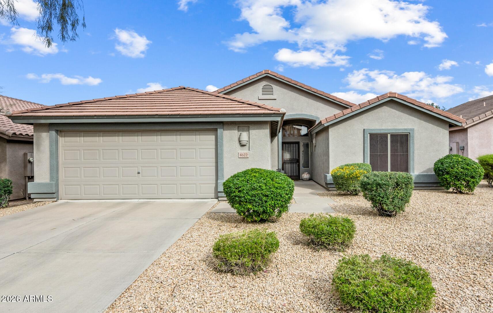 PRIDE OF OWNERSHIP!!  Beautifully updated and meticulously maintained single-level home featuring 3 bedrooms+ DEN/OFFICE, 2 bathrooms, and an oversized 2-car garage with storage cabinets. Recently renovated with new flooring, fresh interior paint, and fully updated kitchen and bathrooms showcasing modern finishes. The bright, open layout offers comfortable living and easy entertaining, while the low-maintenance desert landscaping adds curb appeal without the upkeep. Move-in ready with true pride of ownership throughout!