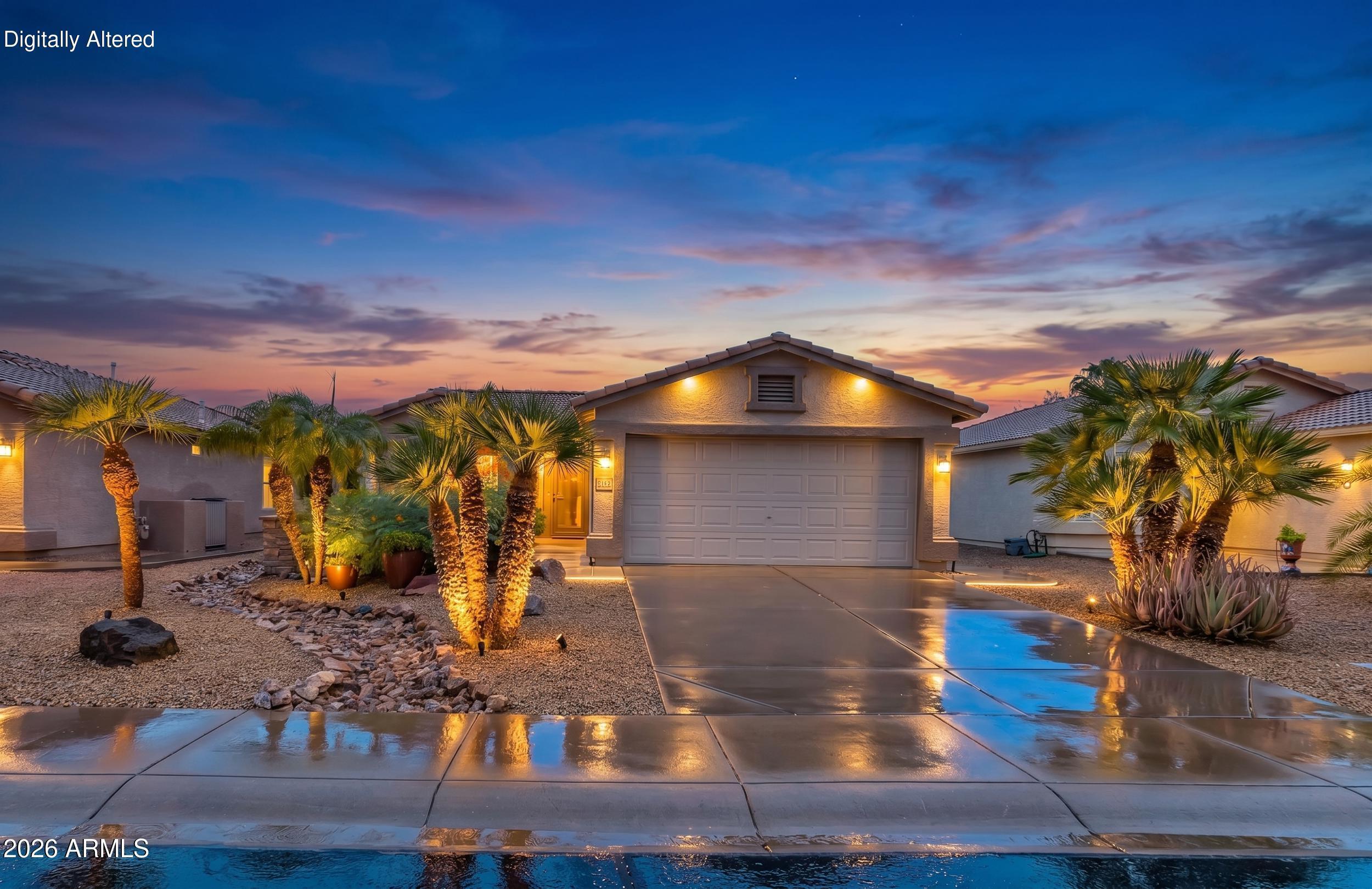 Meticulously maintained and heavily upgraded, this unique two-bedroom home offers an exceptional open-concept floor plan. The stunning curb appeal features a custom Andersen door, epoxied walkway, paver-covered front patio, and landscape lighting. Inside, the spacious great room boasts vaulted ceilings, recessed lighting, and plantation shutters throughout.
The chef's kitchen is a standout, featuring 42-inch custom cabinetry with lighted display uppers, pull-out shelving, a spice rack, and a lazy Susan. Premium granite counters and full backsplash accent the large island, undermount stainless steel sink, chef's faucet, and drawer microwave. Under-cabinet angled outlet strips keep the workspace sleek and clutter-free.
The primary suite offers French doors to the patio and a luxurious en- suite with a custom walk-in shower, European rain head, and dual-sink vanity. Relax outdoors under the expansive, epoxy-coated rear patio spanning the entire length of the home. Includes a spacious laundry room and an attached garage with epoxy floors, built-in cabinets, and a workbench space.