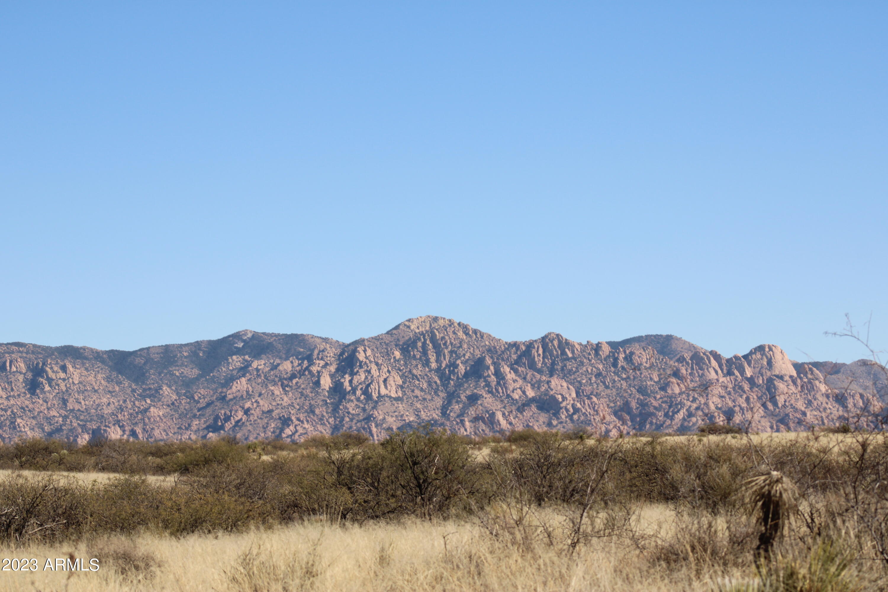 Beautiful property with stunning Panoramic View. The Dragoon Mountain Ranch subdivision is in St David AZ. The ranch consists of approximately 14,000 acres and adjoins 52,000 acres of the Coronado National Forest wilderness area. The ranch is also adjacent to thousands of acres of State Trust lands. Both the National Forest and State Trust lands provide a wildlife sanctuary. Originally the Horse Ranch was established in the 1800's. The adjacent Dragoons as well as the Rincons range to an elevation of over 7000 feet. Nearby towns and cities are Benson, Bisbee, Tombstone, Willcox and Sierra Vista all in Cochise County. Tucson is about an hour drive from the ranch and has a population of over a ½ million