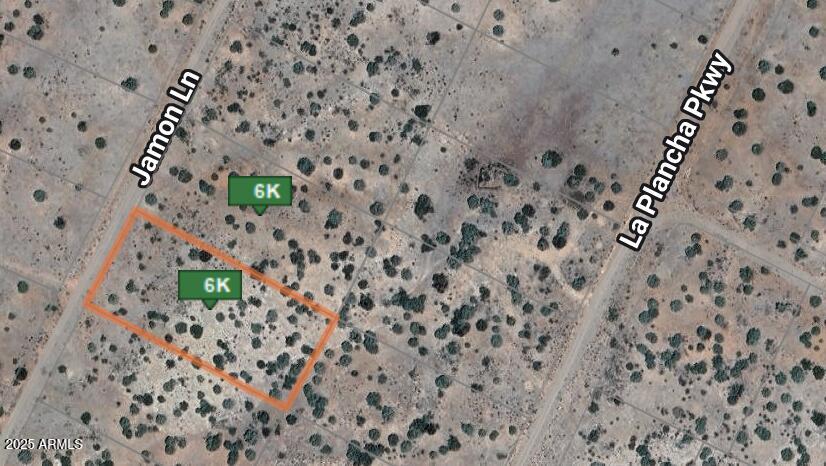 Motivated Seller! Own part of the desert state today with this lot for sale outside of Seligman, Arizona. Additional properties in the area. Bundle and Save. Buyer to verify all pertinent information. Seize this opportunity!