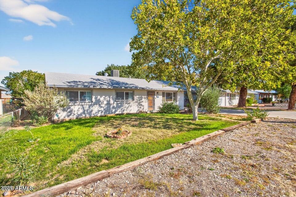 **NEW ROOF!!!** This cozy 3-bedroom, 2-bath home is located just minutes from the Main Gate at Ft. Huachuca! Move-in ready, this charming gem features a bright living area, a spacious kitchen, and an extra room that can be ideal for a home office or hobby space. Enjoy the large, fully fenced backyard with lush grass, mature trees, and a separate storage shed. Conveniently situated near schools, shopping, and dining, this home is perfect for first-time buyers, military families, or anyone seeking a turnkey home in Sierra Vista!