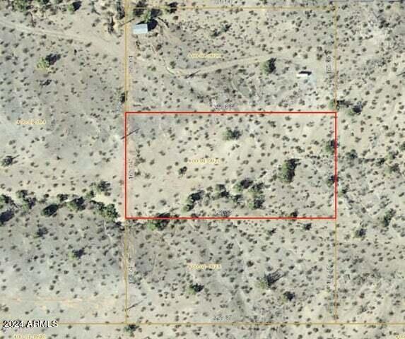 This enchanting land lot offers breathtaking panoramic views of majestic mountains, and tranquil valleys. Nestled amidst gently rolling hills, there is scenic views. This lot is the perfect canvas is a place to customize a new build or manufactured home with a stunning scenic surroundings . This is a great location if you are looking to be close to the race tracks, use your outdoor toys, activities, and a place for your horses. Don't miss the chance to make this scenic paradise your own. Go and check it out!