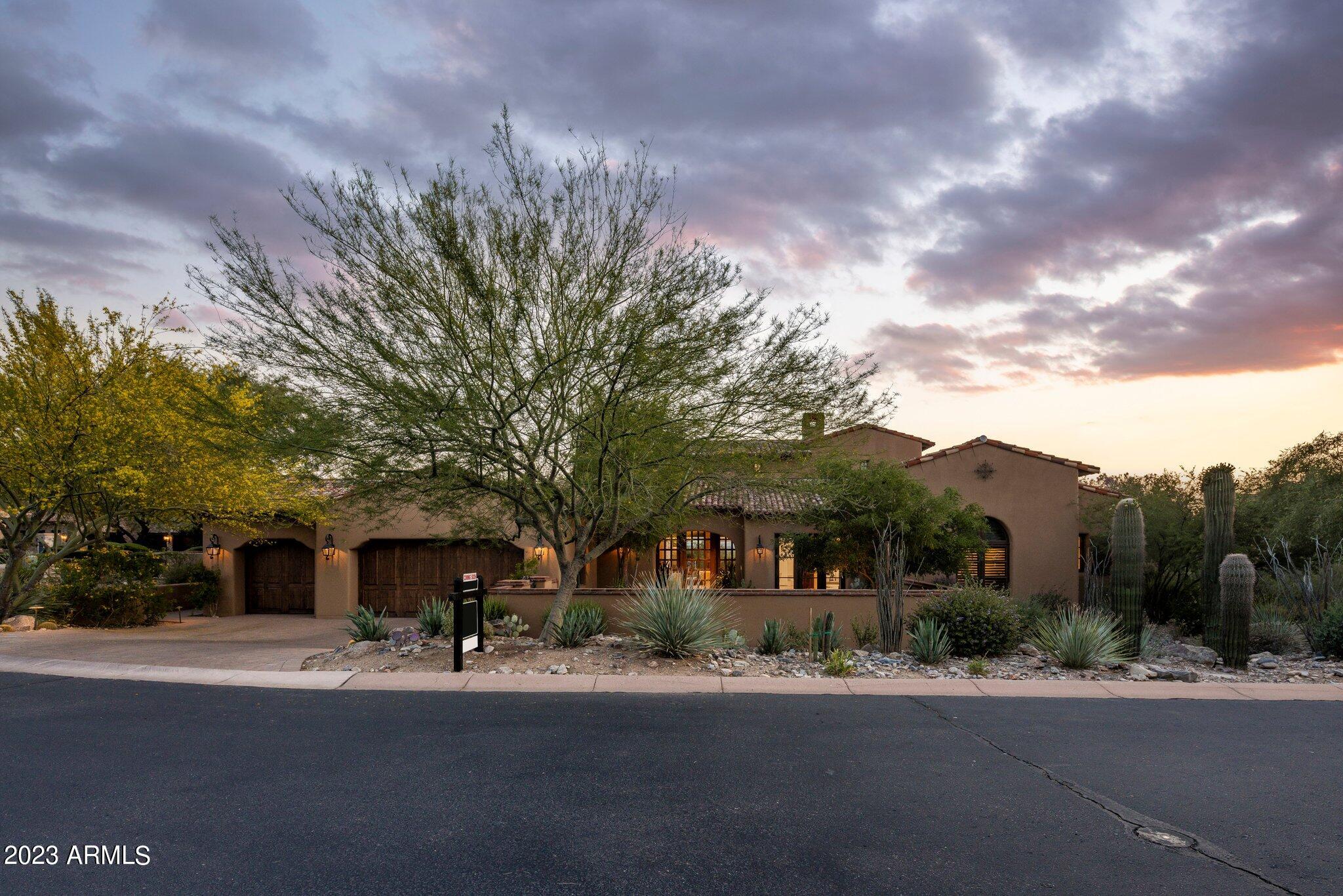 Introducing a fabulous Casita in the prestigious Horseshoe Canyon at Silverleaf, where luxury living meets impeccable attention to detail. This meticulously maintained residence offers a range of high-end features and stunning design elements that are sure to captivate even the most discerning buyer. 

As you step through the front courtyard, you are greeted by a captivating water feature, setting the tone for the elegance that awaits. The open floor plan seamlessly blends indoor and outdoor living, creating a harmonious space for relaxation and entertaining alike. 

This home boasts a spacious principal suite and an additional 2 guest bedrooms, ensuring privacy and comfort for all. Additionally, there is a dedicated office space or theater room, perfect for those who work ... MORE from home or desire a tranquil retreat. 

The kitchen is a culinary enthusiast's dream, featuring all new appliances and exquisite details such as granite countertops with quartz inclusion. The butler's pantry includes a laundry room and even a steam oven, catering to both convenience and style. 
An enclosed bar area awaits, complete with a wine refrigerator and dishwasher, making it effortless to entertain guests in style. The wood beams throughout the home add warmth and character to the already inviting atmosphere.  Practicality meets luxury with a three-car garage featuring epoxy floors and built-in cabinets, offering ample storage and organization options. 

The outdoor spaces are equally enchanting. Multiple water features and a cozy firepit enhance the overall ambiance, creating a serene and tranquil environment. A guest casita provides an additional private space for visitors or can be used as a home office or exercise room.  The covered patio is an idyllic retreat, featuring ceiling heaters, and a fireplace, allowing you to enjoy the outdoors all year round. The outdoor kitchen, complete with a built-in BBQ and sink, offers the perfect setting for al fresco dining and entertaining.  The centerpiece of this remarkable property is the zero-edge pool, providing a refreshing oasis with breathtaking views of the surrounding mountains and city lights. It is an ideal spot to relax, unwind, and soak up the natural beauty that surrounds you. 

Don't miss this opportunity to own a truly remarkable property in one of the most prestigious communities in the area. Contact us today for a private tour and experience the epitome of luxury living firsthand.