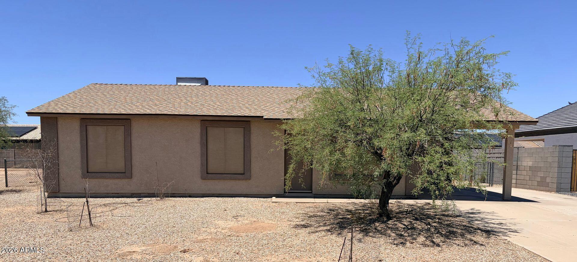 This ranch style home in Arizona City offers a straightforward single-story layout with 3 bedrooms and 2 bathrooms. The property delivers practical residential space suited to first-time buyers and those seeking accessible, no-frills living.

The interior features tile flooring throughout, providing durable and easy-to-maintain surfaces across the home. Bedrooms are distributed for privacy, with the primary suite positioned at the rear. The two full bathrooms serve the bedrooms and main living areas efficiently. The open floor plan connects living spaces in a logical flow from entry to back, creating natural traffic patterns for everyday use.

Ask your agent to see  this home in person.