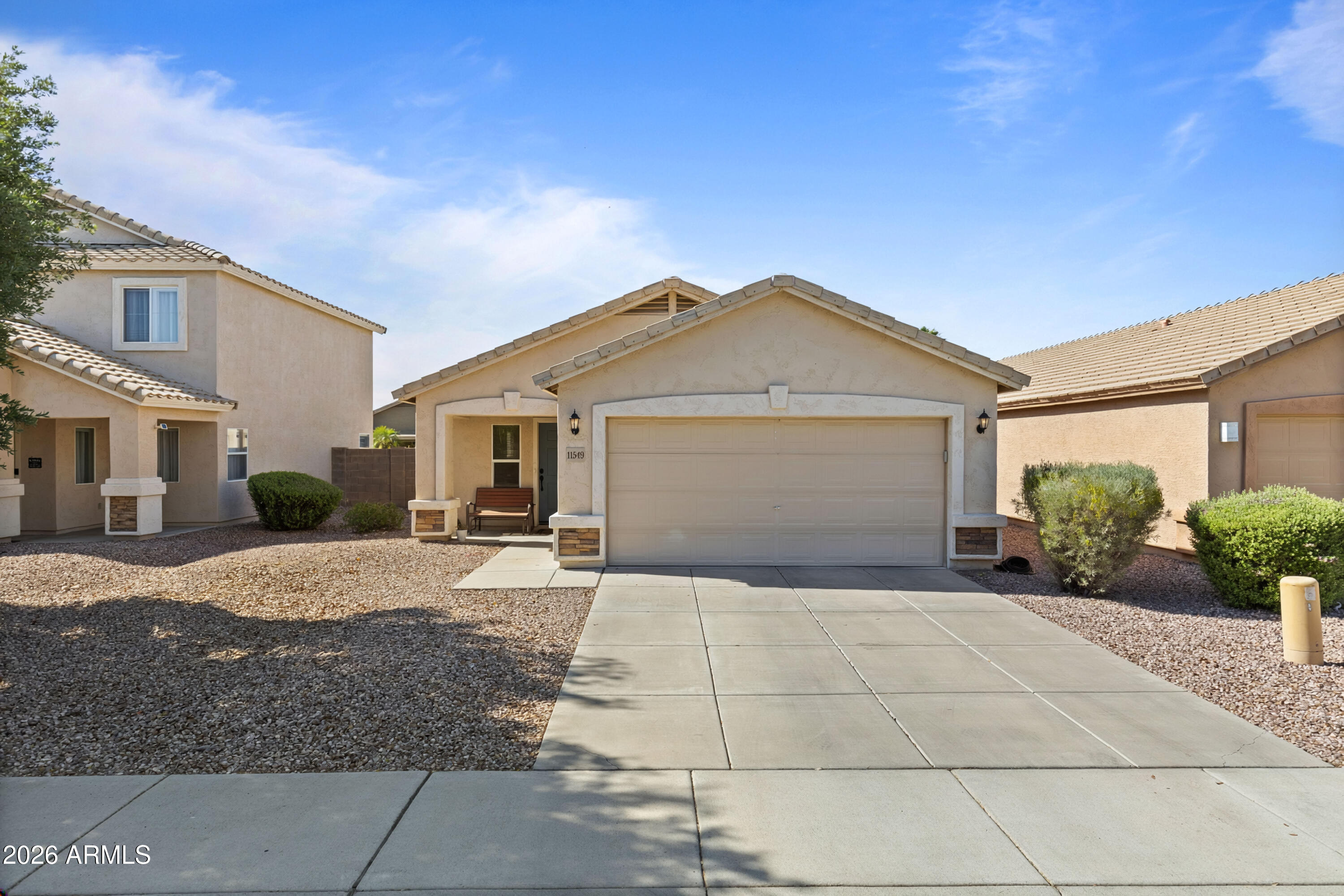Updated and move-in ready, this Agua Fria Ranch home is a standout in the Northwest Valley. Step inside to an open, airy living space featuring new ceramic tile and abundant natural light. The spacious kitchen offers both a dining area and breakfast bar--perfect for everyday living or entertaining. Generously sized bedrooms continue the clean, cohesive look with consistent flooring throughout. Enjoy a low-maintenance yard and convenient access to parks, shopping, and major routes. Don't miss your chance to make Vogel Ave your next address!