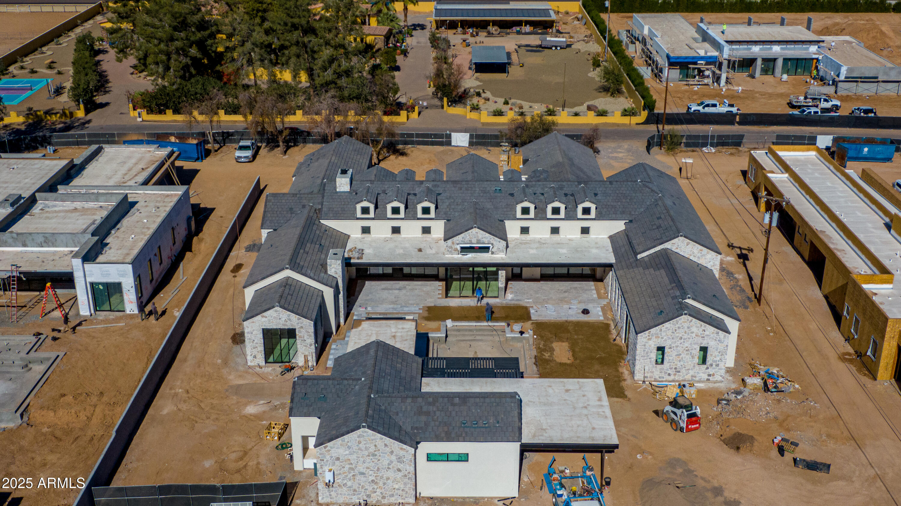 COMPLETION DATE is 3/30/2025!  Modern farmhouse masterpiece by Patterson Homes, this trophy property spans 8984 sq.ft. with a 5 bedroom / 5.5 bathroom / 4 car garage main house, a poolside guest house with 1 bed / 1.5 baths and a very spacious 58 ft. RV garage.  An entertainer's delight showcasing an expansive pool area, sport court, outdoor BBQ / kitchen, al-fresco dining, theater room, and game room with a bar. All this and more situated on 1.08 acres.  
Entering the grand great room you are welcomed by soaring ceilings, superabundant natural light, and a magnificent floor to ceiling limestone fireplace. There's a gourmet kitchen boasting an inviting island, Thermador appliances, and a butler's pantry with prep kitchen. Be WOW'd by the high end finishes and lavish details. The primary suite offers tranquility to that of a 5 start hotel with a limestone fireplace, sitting room, and an extravagant primary bathroom with a grandiose custom walk-in closet. The guest suite and all additional bedrooms are ensuite with walk-in closets for maximum comfort.  Welcome to the oasis of your dreams.

SPEC BOOK under Documents