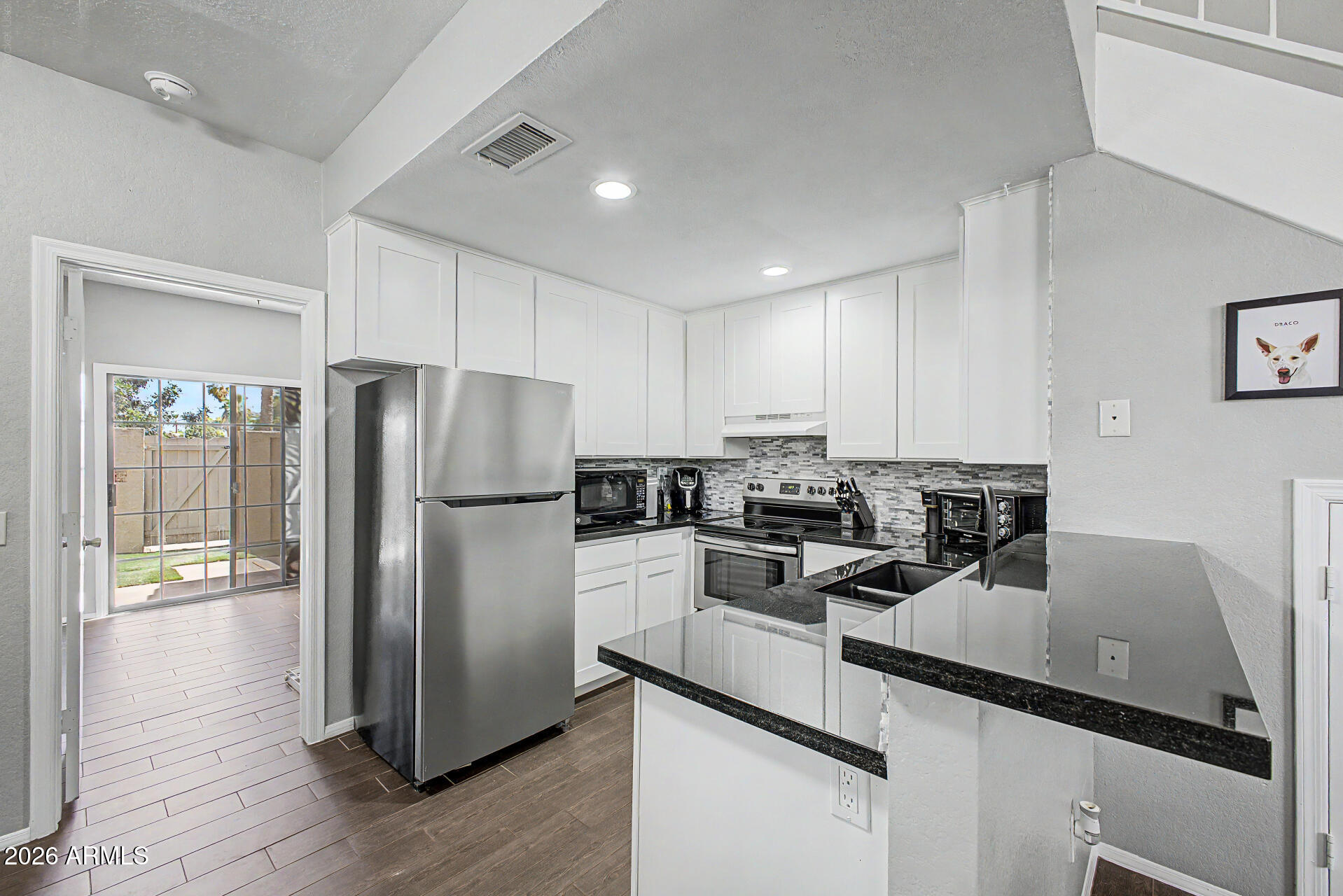 Welcome to this carefully updated 2 bedroom, 2 bath townhome, this home offers a bright, comfortable layout opening first with a vaulted ceiling to display modern finishes throughout, including an updated kitchen that's perfect for everyday living. A living room that feels inviting and functional, while the private bedrooms provide plenty of room to escape and relax. A new roof adds peace of mind, giving buyers added confidence in the home's condition and care. With easy access to shopping, dining, and major freeways, this townhome blends comfort, style, and convenience in one great package for any buyer looking for their next home or the perfect vacation investment for their visits down to the valley.  NEW: Roof - 2026, AC - 2020, Bathrooms - 2026, Kitchen - 2025, Water Heater - 2025.