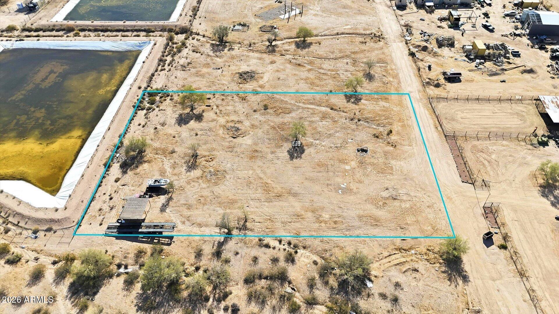 1.25-acre parcel in Pinal County with wide-open desert surroundings and mountain views. Zoned General Rural, allowing for custom homes, manufactured homes, and potential horse or ranch use. No HOA and minimal restrictions provide flexibility to build or hold as an investment. Convenient access to Hwy 84 and SR 347 for commuting to Casa Grande, Maricopa, and the greater Phoenix area. Peaceful setting with plenty of space to create your ideal setup.