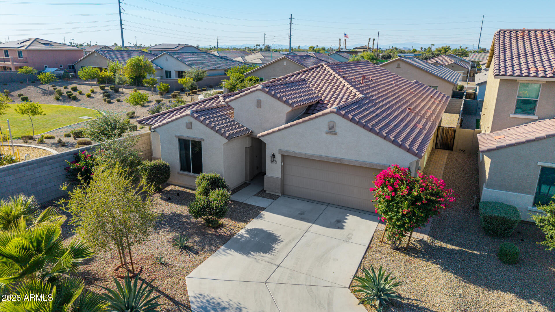 Your new home awaits you here in Olive Grove! This beautiful residence sits just beside the Community park & playground. Offering 3 beds, 2 baths + powder room, 3-car tandem garage, & a manicured landscape. The inviting interior features tons of natural light, a neutral palette, tall ceilings, and wood-look tile w/carpet in bedrooms. You'll love the spacious, seamlessly flowing open layout! The impressive kitchen boasts SS appliances, granite counters, a pantry, recessed lighting, wood shaker cabinets w/crown molding, and an island w/breakfast bar. Double-door den for an office! Large main bedroom has an ensuite with dual sinks, separate tub/shower, & a walk-in closet. Secondary bedrooms with a walk-in closet. Enjoy the sizable backyard with a covered patio & extended pavers! Welcome home!