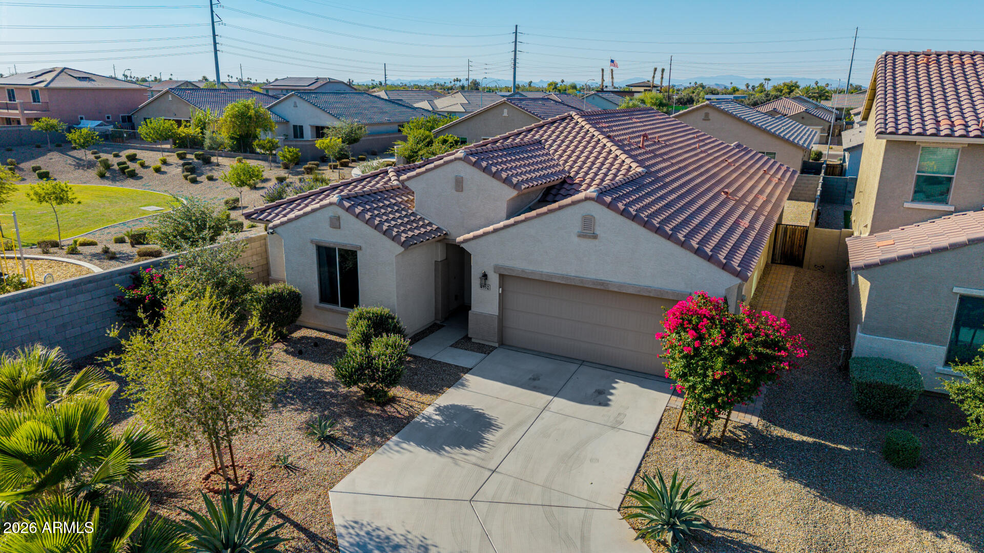 Welcome to 6952 W Golden Ln, a thoughtfully designed single-story residence offering 2,291 sq. ft. of comfortable living space, exceptional functionality, and modern flexibility. Featuring 3 spacious bedrooms, a versatile den, and 2.5 bathrooms, this home delivers the perfect blend of style and convenience.
The heart of the home is an expansive, open-concept design where the living, dining, and kitchen areas flow effortlessly together. Enhanced by a grand entrance foyer, this light-filled layout creates excellent sightlines and provides maximum flexibility for both casual living and large holiday gatherings.The private quarters feature three well-sized bedrooms, including a peaceful primary suite.