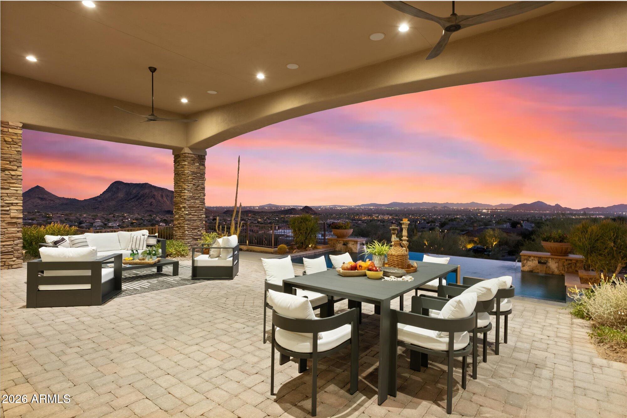 Stunning views in every direction! From Camelback Mountain to your own backyard, this home is all about exploring and enjoying the 2.7 acre lot! Complete privacy and an unobstructed lifestyle, this exceptional custom home is nestled into the hillside of Hawks Canyon at the top of Scottsdale Mountain. Every window has a view! Enter on the ground floor and take the elevator up to the main level featuring a split floor-plan. The moment you enter the courtyard you will love the privacy and intimacy created as you approach the dramatic glass entry doors that capture forever views! Gourmet chef's kitchen includes all Wolf-Subzero appliances, bar seating for 8, and easy access to the outdoor kitchen. Negative edge pool/spa, and an abundance of outdoor patio space Close to MAYO, BASIS, and DMHS!