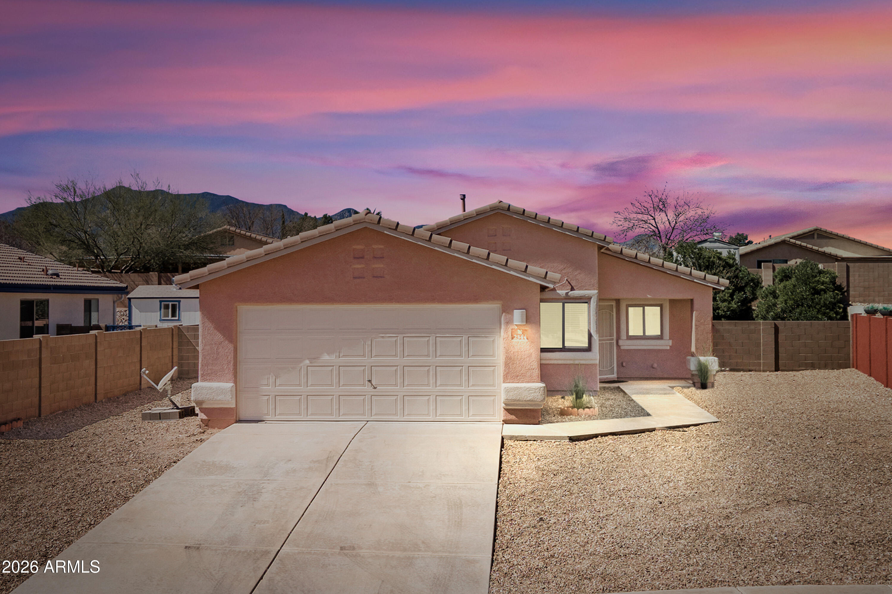 Welcome to this inviting 3-bedroom, 2-bath home located in the sought-after Copper Sky subdivision, where homes seldom come to market. Positioned on a quiet cul-de-sac, the property offers easy access to Fort Huachuca, shopping, dining, parks, midtown, and the Sierra Vista Mall.

Inside, the home features modern lighting and ceiling fans for a clean, contemporary feel. The A/C system and water heater are in good working condition, contributing to the home's comfort and reliability. The bathroom includes a walk-in shower with safety grab bars. The backyard is set on elevated ground, allowing the surrounding walls to provide additional privacy and a relaxing outdoor space.

Enjoy nearby walking and biking paths with scenic views of the Huachuca Mountains. A comfortable and move-in ready