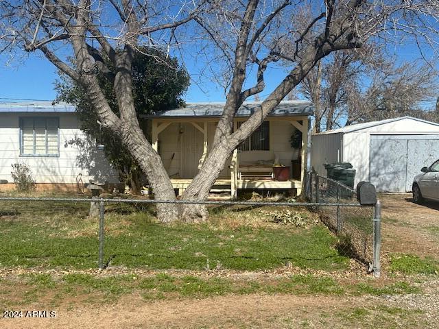 3 Bedroom, 1 Bath, Detached 1 Car Garage/Storage. Fully fenced large corner lot with double gate entry. Front and Back yard covered porches.