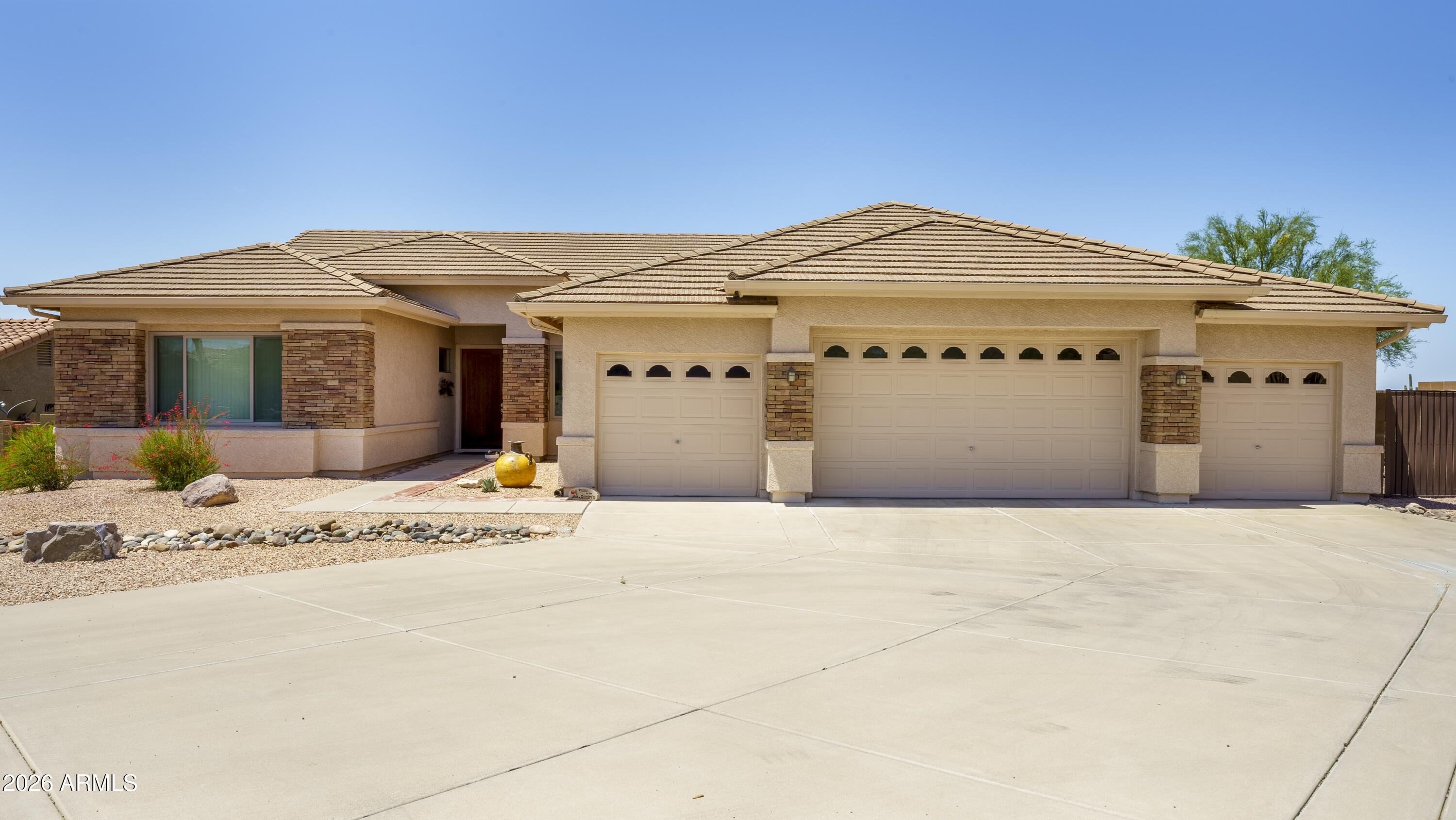 Unique, rare 4 car garage, with RV gate for another vehicle! Exciting negative edge pool
with Incredible 180 degree Mountain & City Light views.  Irresistible 2.5 bath home PLUS Den !  All  NEWER WINDOWS.! Open great plan! You will love. sharing gourmet gas cooking in Big kitchen using high end stainless appliances. Granite counters on breakfast bar with backsplash. Quality 36Inch cabinets some with glass inserts. Love life  from your exquisite Deep Infinity Pool.   Expanded patio area with flagstone & water feature. Some furniture available. HURRY! WOW factor present! Sellers want it sold. They have closed on their new home in a 55 plus community.