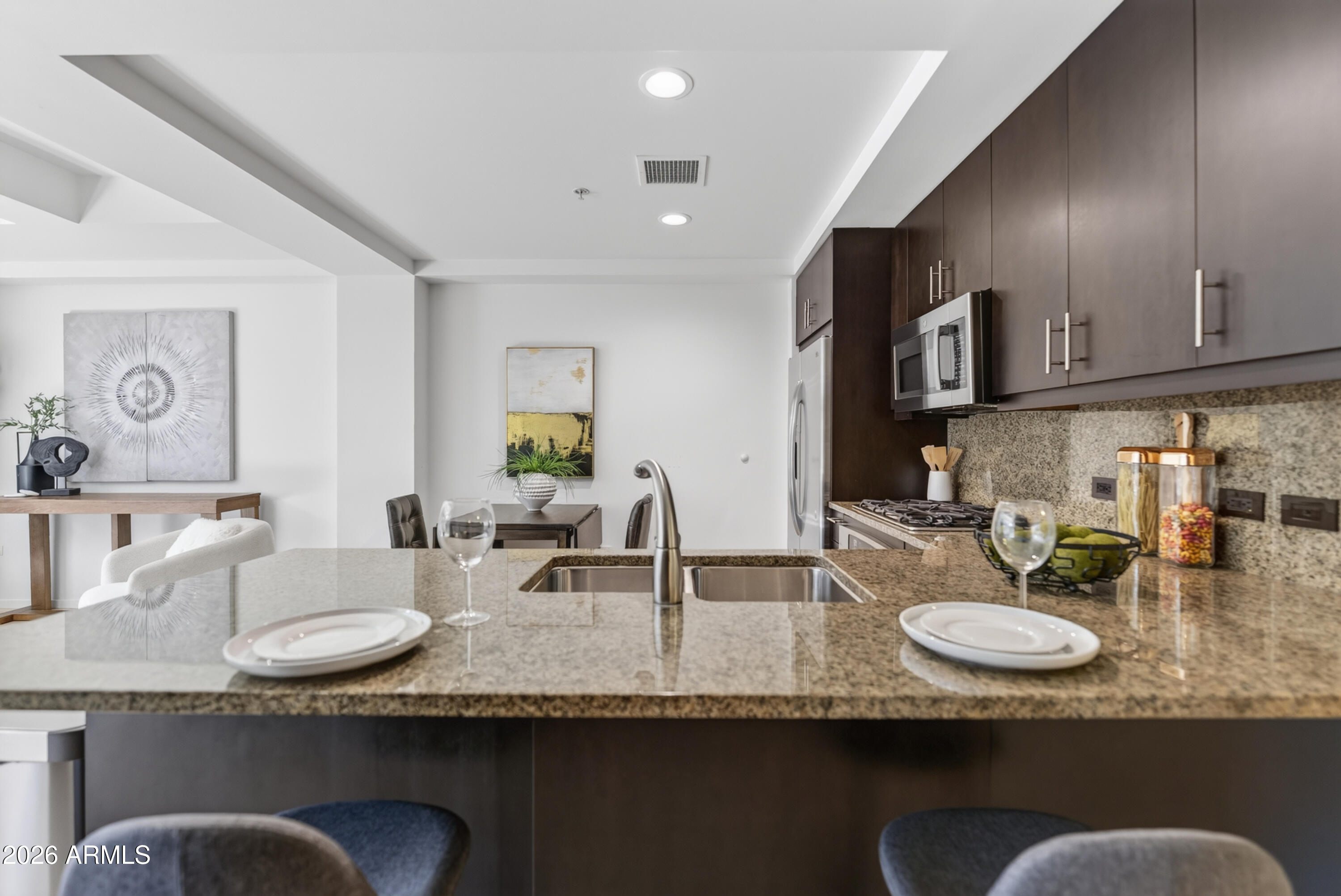 OPTIMA CAMELVIEW VILLAGE CONDOMINIUM 2ND AMD MCR 803-35 UNIT 5008 BLDG 1 7117 E RANCHO VISTA DR - Residential