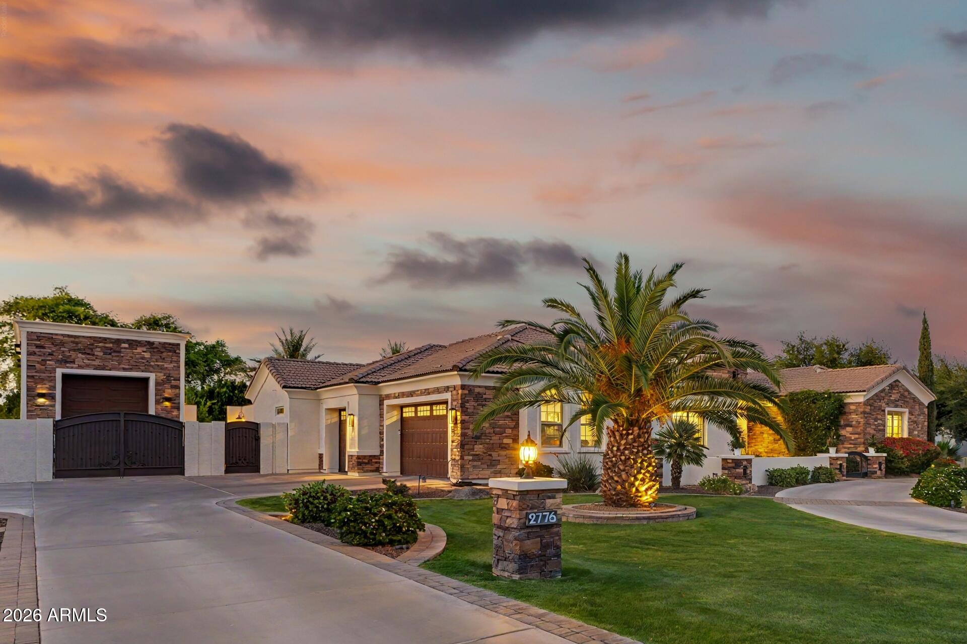 Experience luxury living in the highly sought-after custom community of Circle G. Situated on nearly an acre, this beautifully remodeled 3,700 sq. ft. estate offers the perfect blend of elegance, comfort, and resort-style amenities. The home features 4 spacious bedrooms and 4.5 bathrooms, along with a private office and an expansive game room--ideal for both everyday living and entertaining. Thoughtfully updated throughout, you'll find new cabinetry, fresh interior paint, designer finishes, and high-end appliances. The chef's kitchen is the heart of the home, showcasing a large island with additional bar seating and seamlessly flows into the family room. A cozy fireplace and expansive pocket doors create true indoor-outdoor living, opening to a stunning backyard retreat. One of the en-suite bedrooms offers its own private entrance, making it perfect for guests, multigenerational living, or a private casita setup. The additional bedrooms each feature their own bathrooms, while a convenient powder bath serves your guests. Step outside to your own resort-style oasis--complete with a sparkling pool and spa, pickleball court, fire pit, built-in BBQ, and a large grassy area for play or relaxation. The covered patio with outdoor fireplace is ideal for enjoying the Arizona evenings. Additional highlights include a detached garage with ample storage, RV gate, extra parking, and a circular driveway for easy access and impressive curb appeal. This exceptional property offers the space, upgrades, and lifestyle today's buyers are looking for--all in one of the area's most desirable neighborhoods.