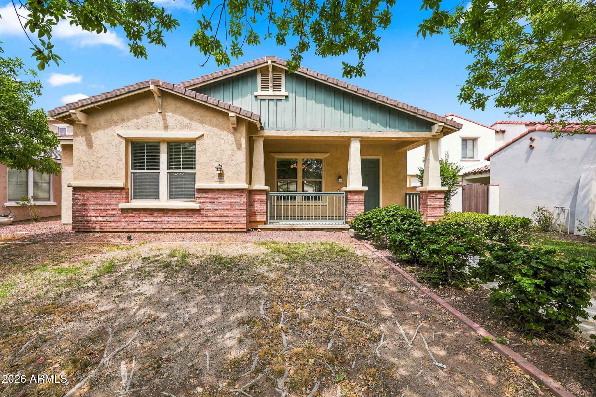 COMING SOON in Verrado's Heritage District! This 3 bed, 2 bath home sits an easy walk from Verrado Heritage Elementary and the Heritage Swim Park, with a neighborhood park just down the street. The split floor plan opens to an eat-in kitchen with granite counters, stainless steel appliances, gas cooktop and double ovens. Mature shade trees and established landscaping give the backyard a lived-in feel new construction can't match yet, complete with a covered patio and room to entertain. Verrado's Main Street shops, dining, golf and Heritage Swim Park are all just minutes away. Move-in ready and priced below the Heritage District median.