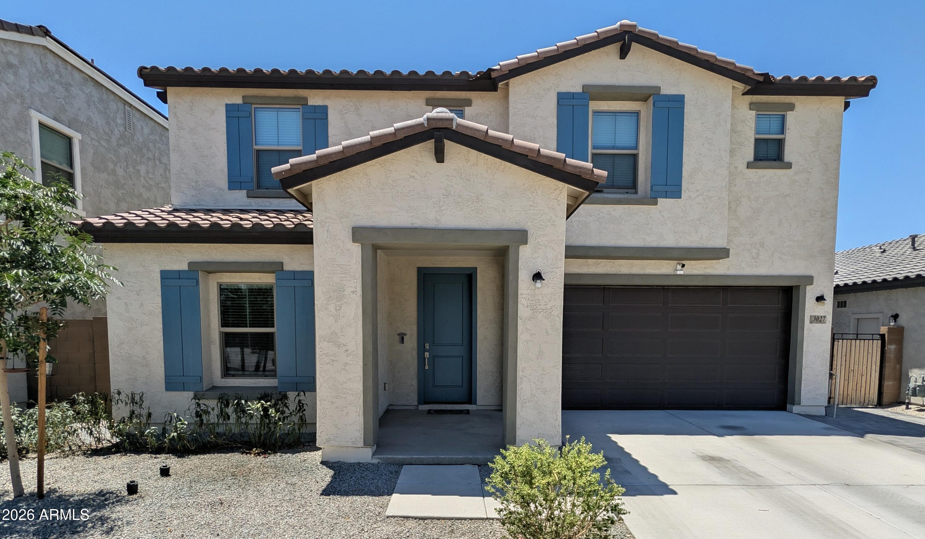 Welcome to your better-than new home in North Phoenix, offering five spacious bedrooms and three full baths. The main level offers a bright, modern kitchen with quartz counters and stainless appliances, a spacious living area, a bedroom and a full bathroom. Upstairs, enjoy a large loft and a peaceful primary retreat with a spa-like ensuite and dual walk-in closets. The fully landscaped backyard features turf, a fire pit, extended pavers, stunning sunset and mountain views, and is pre-plumbed for a jacuzzi, grill, and sauna. Move-in ready with spacious bedrooms, handsome upgrades, and a quiet neighborhood conveniently located near top-rated schools, dining, and shopping all mean one thing- you've found the one! 2-car garage has polymer finish. Water softener and whole-home filtration.