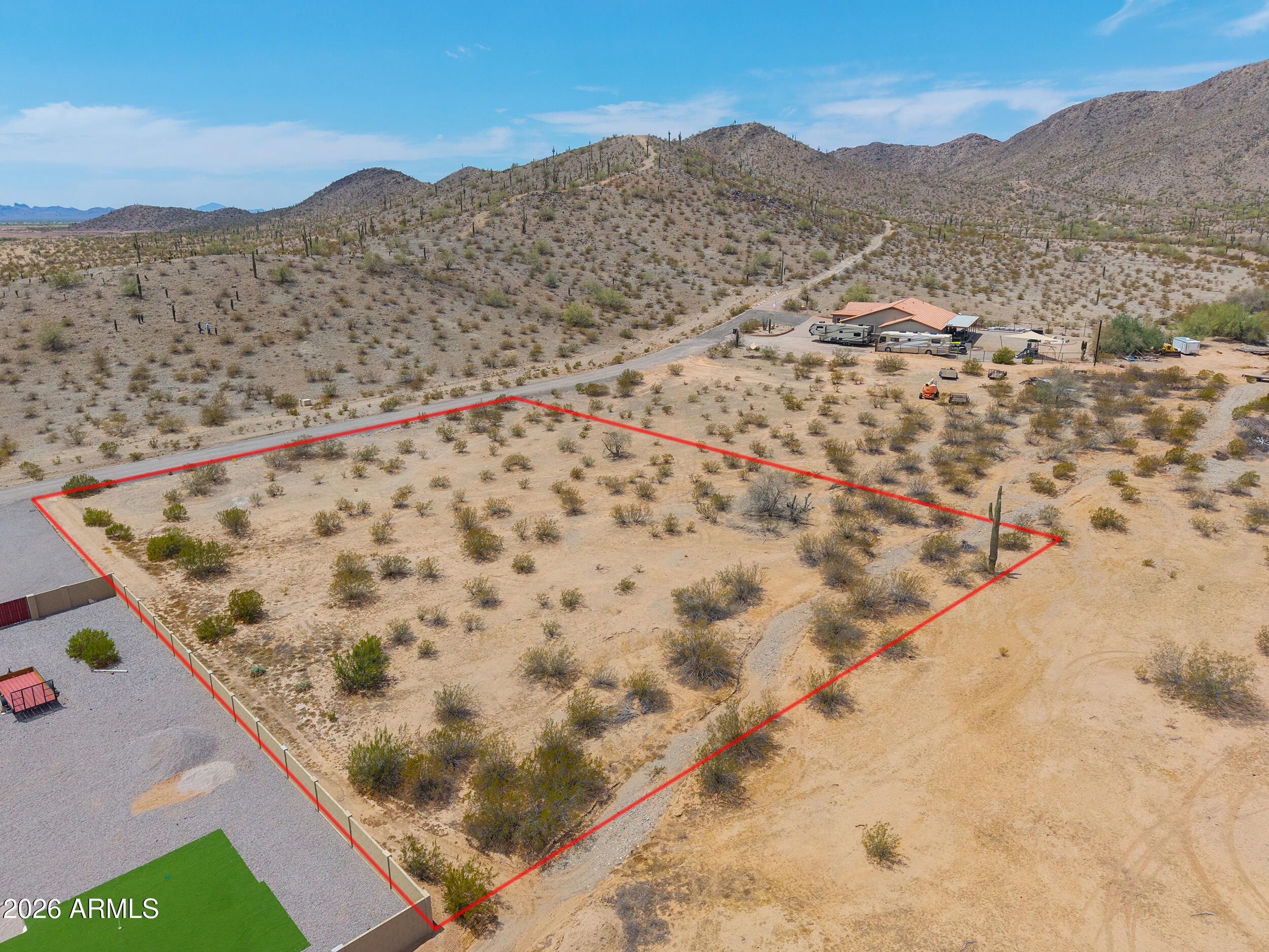 Essentially LEVEL ACRE LOT in highly sought after Mountain View Estates subdivision! Build your dream home in the sunset shadow of Casa Grande Mountain! This premium homesite is likely to percolate for installation of a conventional septic system; neighboring homes on north side of the road have standard septic systems! Narrow dry wash along northerly lot boundary. Restrictions for new on-site construction: min 2000 SF for 3 BDRM hm. No trailers, mobile homes, trash cans, or clothes lines visible. AZ WATER Co water line along lot edge. APS POWER, telephone & Internet service across the road from south lot line. Enjoy miles of hiking & biking trails nearby, plus the serenity of desert living!