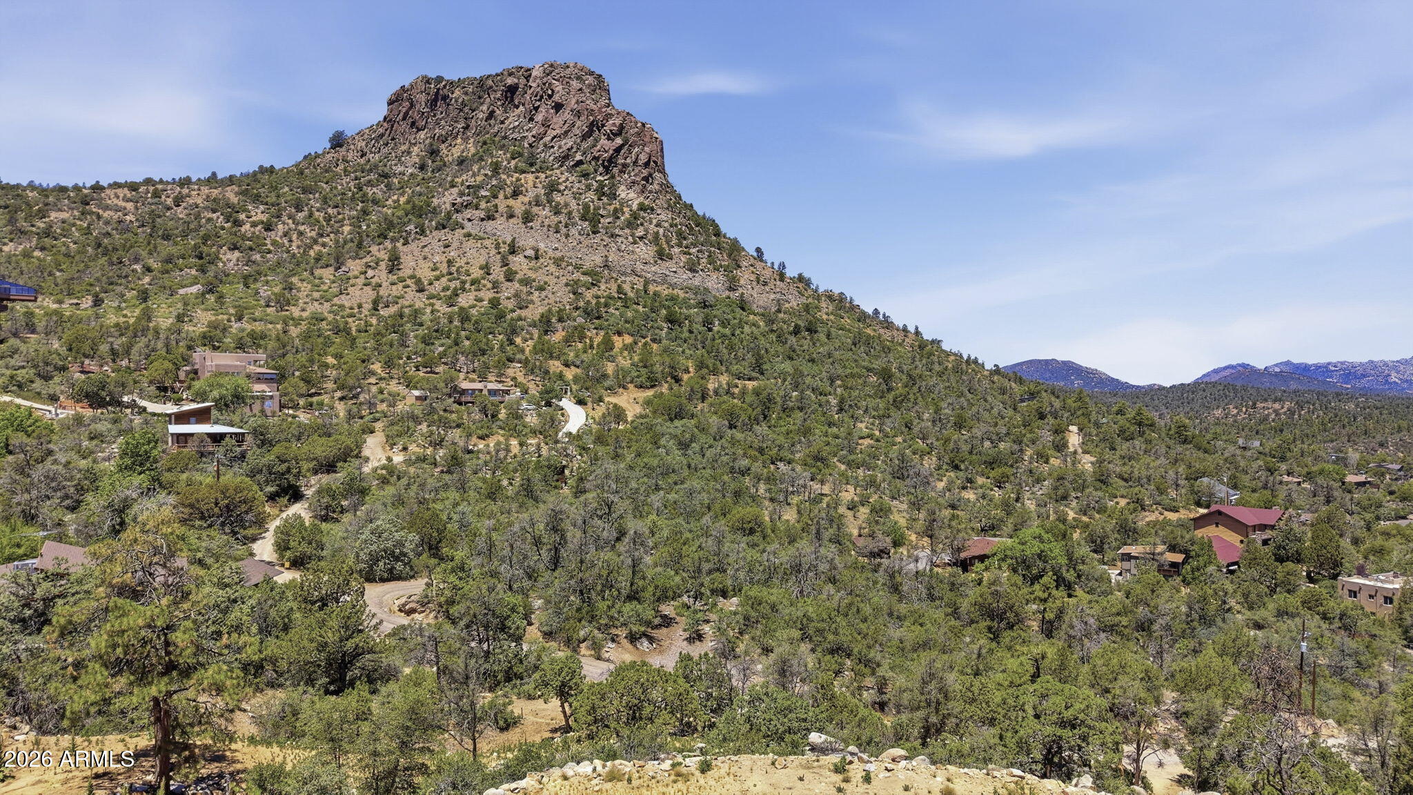 Experience the beauty and serenity of Prescott from this private homesite with breathtaking Thumb Butte views. Situated among the area's natural landscape, the property offers an engineered building pad and private well, providing a head start toward creating your custom dream home. Enjoy quiet surroundings, abundant wildlife, and star-filled nights while remaining just minutes from downtown Prescott. No HOA!