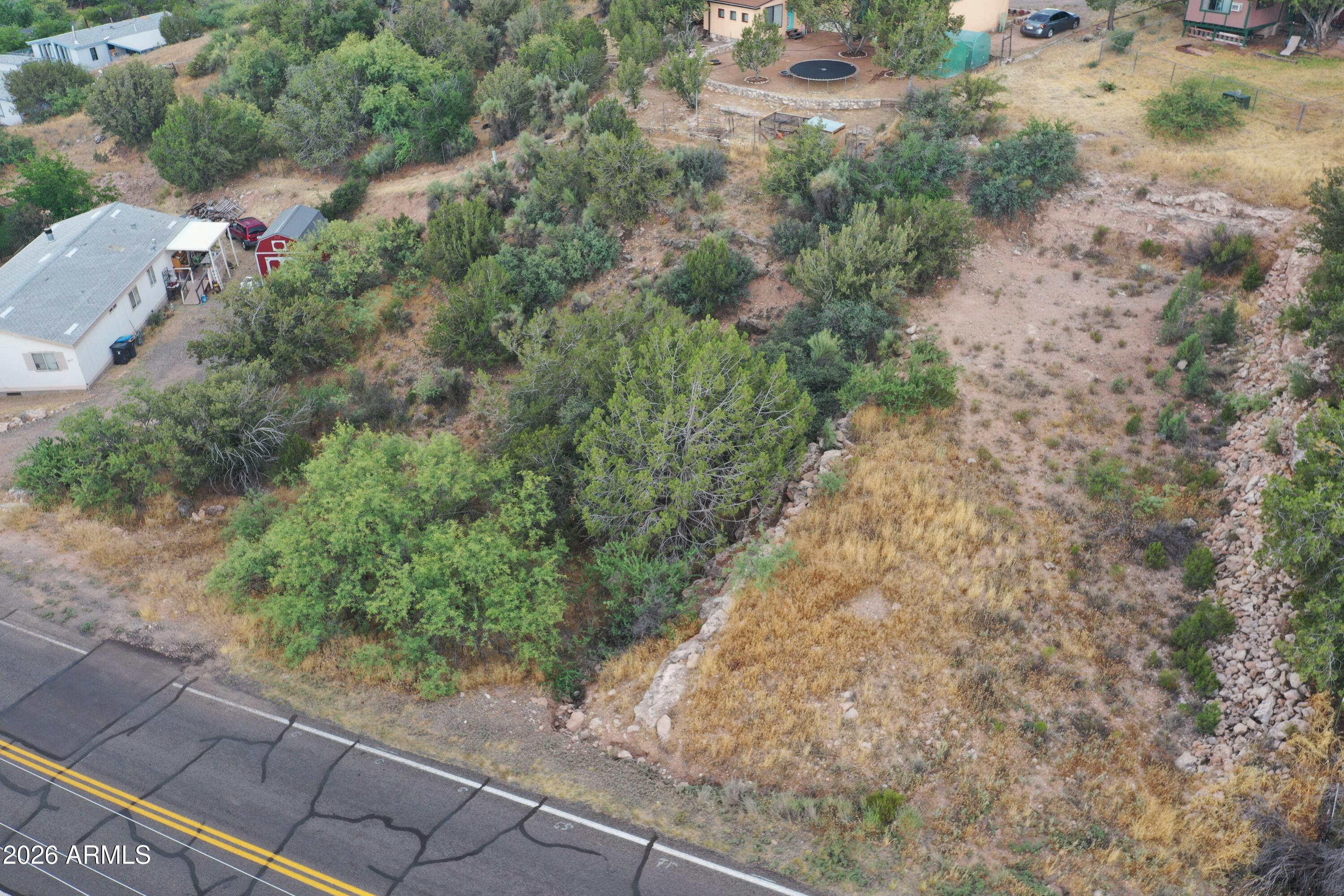 Hard to find .12 Acre parcel zoned R1-10 allowing for site built and manufactured homes! Convenient Rimrock location just moments from the park for creek access. Easy access to I17, only about 60 minutes to Prescott or Flagstaff, less than 30 to the Village of oak Creek.  Water and electric are available, septic will be required to build.