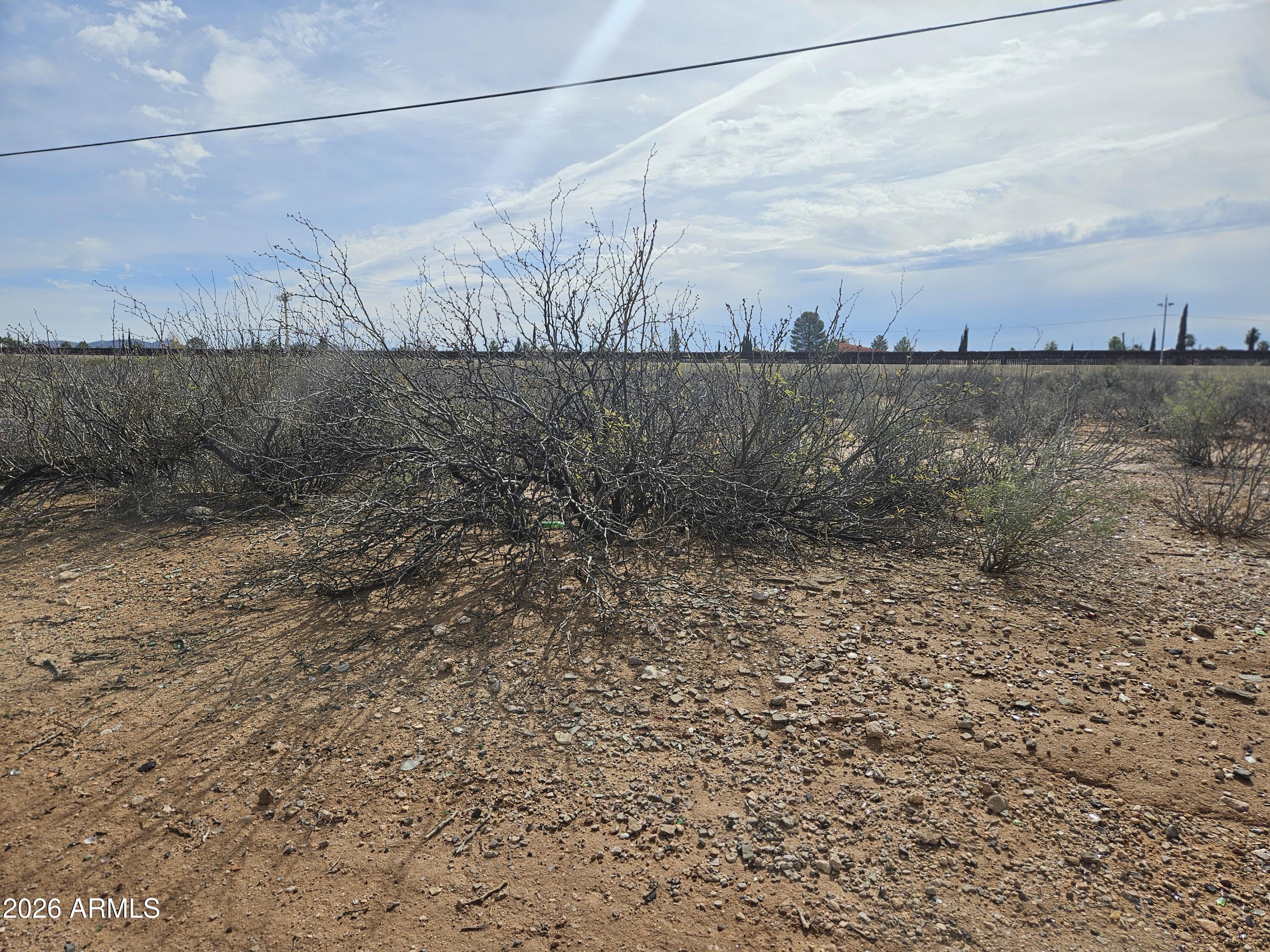.65 ac of raw land right behind Casas de Esperanza Apartments. Great opportunity for your next project. Potential Buyer to determine the correct size, and zoning for their building project. Motivated Seller. Buyer to verify all facts.