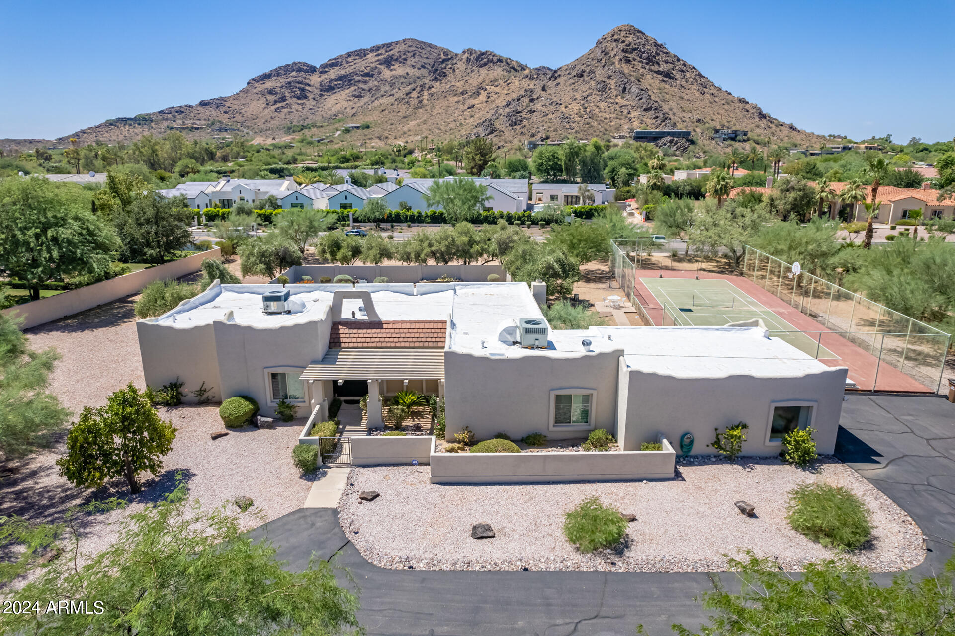 Flat 1.063 acre North/South parcel in the heart of Paradise Valley with a South facing backyard that offers amazing Mummy Mountain views.  Ideal opportunity for new owner / builder to design a new home that captures very hard to replace views of Mummy Mountain on a lot located with ideal access to the heart of Paradise Valley.  Home is 1 block away from Cherokee Elementary school and easily accessible to all of Metro Phoenix, Hwy 101, Old Town Scottsdale, etc.