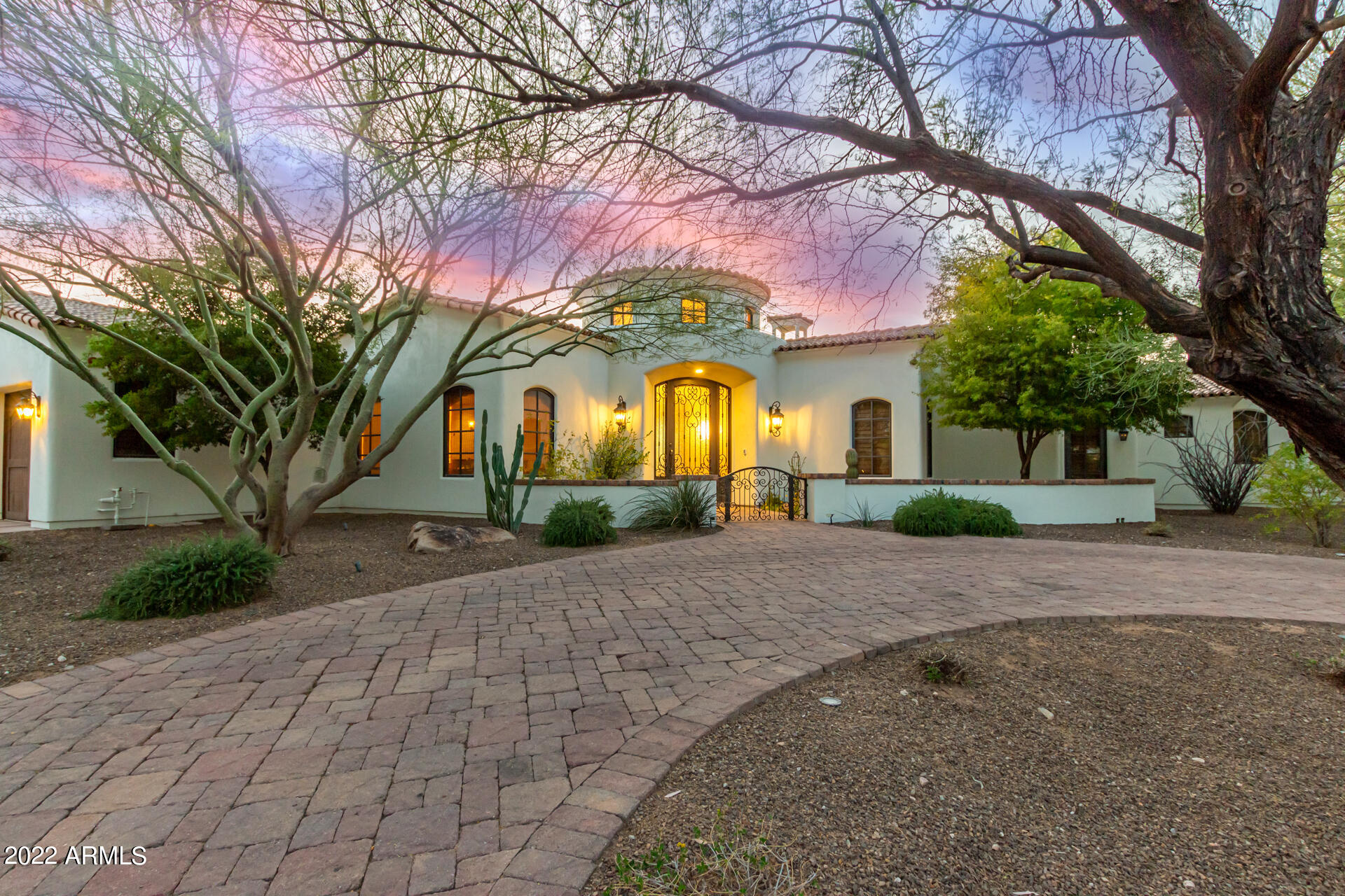 LEASE PURCHASE OPTION AVAILABLE! This custom Estate from Catalina Homes is exactly what you've been searching for.  Walking distance to Phoenix Country Day one of Arizona's most sought-after schools, you couldn't ask for a better location.  This home features all ensuite bedrooms, huge flex/teen room, spacious living room, chef's kitchen featuring Wolf and SubZero appliances, Miele Coffee Machine formal dining and wine cellar. Expansive Master Suite features a luxurious bath with steam shower, spacious closet and private workout room. The resort back yard has a lap pool and large hot tub, outdoor kitchen with fireplace and a large covered patio with misting system.  With meticulous design, you will find that this home offers supreme comfort and luxurious living in Paradise Valley.