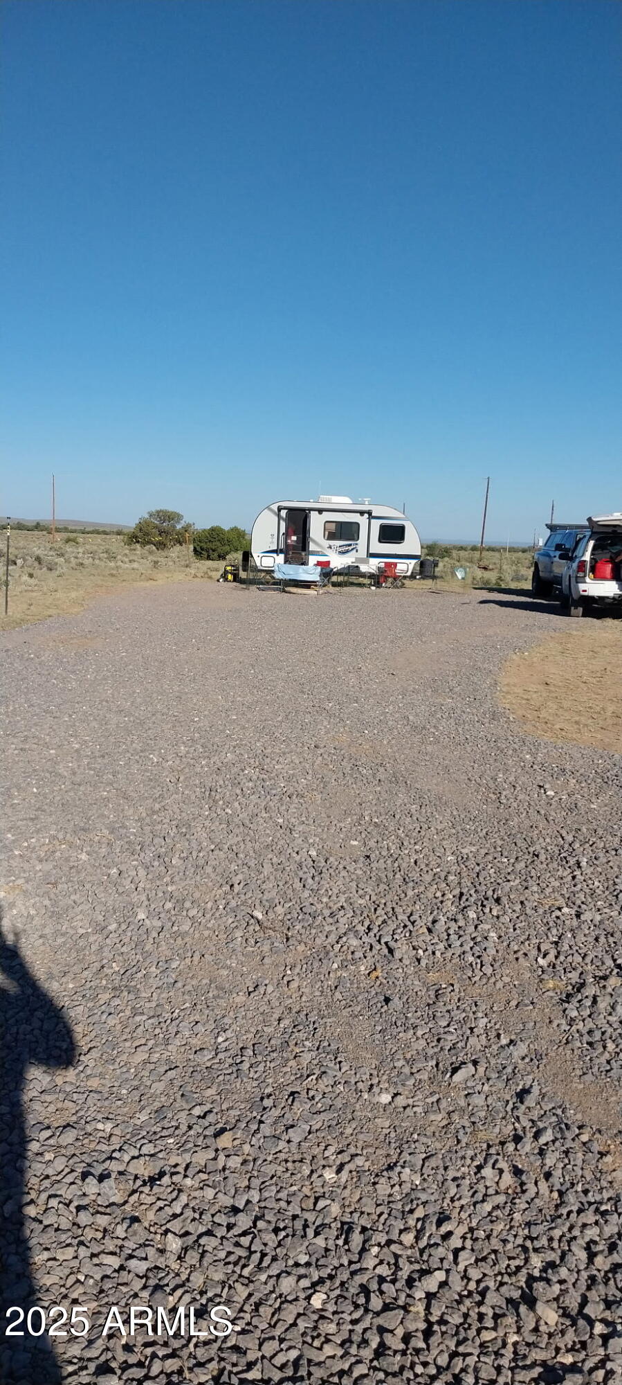 Beautiful unobstructed views. Centrally located between Williams and the Grand Caynon. Has gravel driveway and RV pad. There is power available on the back side of the property.