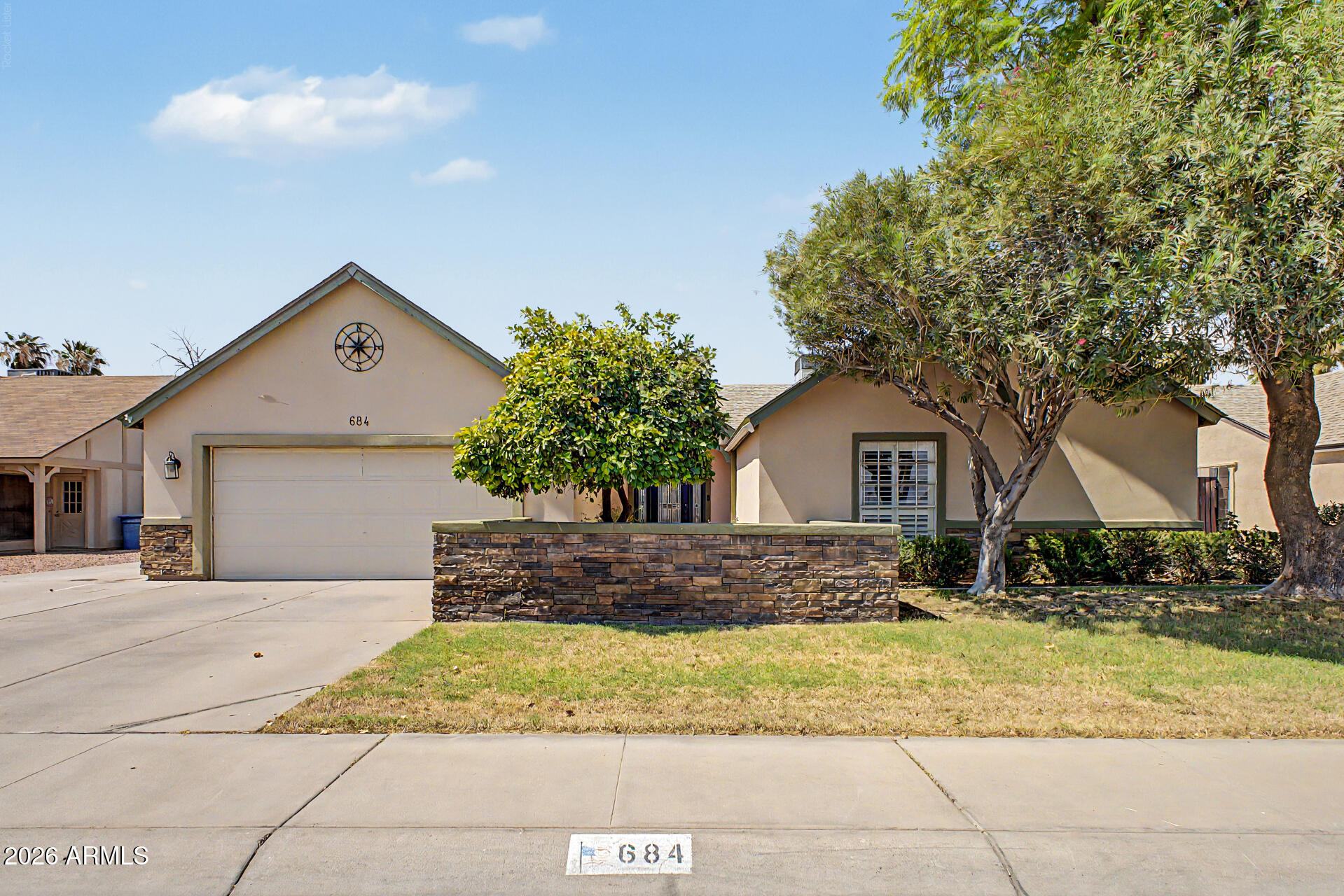 Charming Upgraded Home with Diving Pool - No HOA!
Welcome to 684 E Estrella Drive, a beautifully upgraded 4-bedroom, 2-bathroom home in the heart of Chandler, AZ. With 1,884 square feet of thoughtfully designed living space, this property offers the perfect blend of comfort, style, and functionality.
Step inside to a large, open great room anchored by two cozy fireplaces -- ideal for both relaxing evenings and entertaining guests. The kitchen is a showstopper, featuring gleaming granite countertops, a spacious center island, and stainless steel appliances, making it a dream for home chefs and hosts alike.
Outside, your private backyard oasis awaits with a sparkling diving pool, fully fenced for safety and privacy. Lush grass in both the front and back yards adds curb appeal and space to play or unwind. RV owners will appreciate the convenient RV gate and dedicated RV parking -- a rare find!
Throughout the home, tasteful upgrades add value and peace of mind. And with no HOA, you'll enjoy the freedom to make this home truly your own.
Don't miss this exceptional opportunity in a fantastic Chandler location!