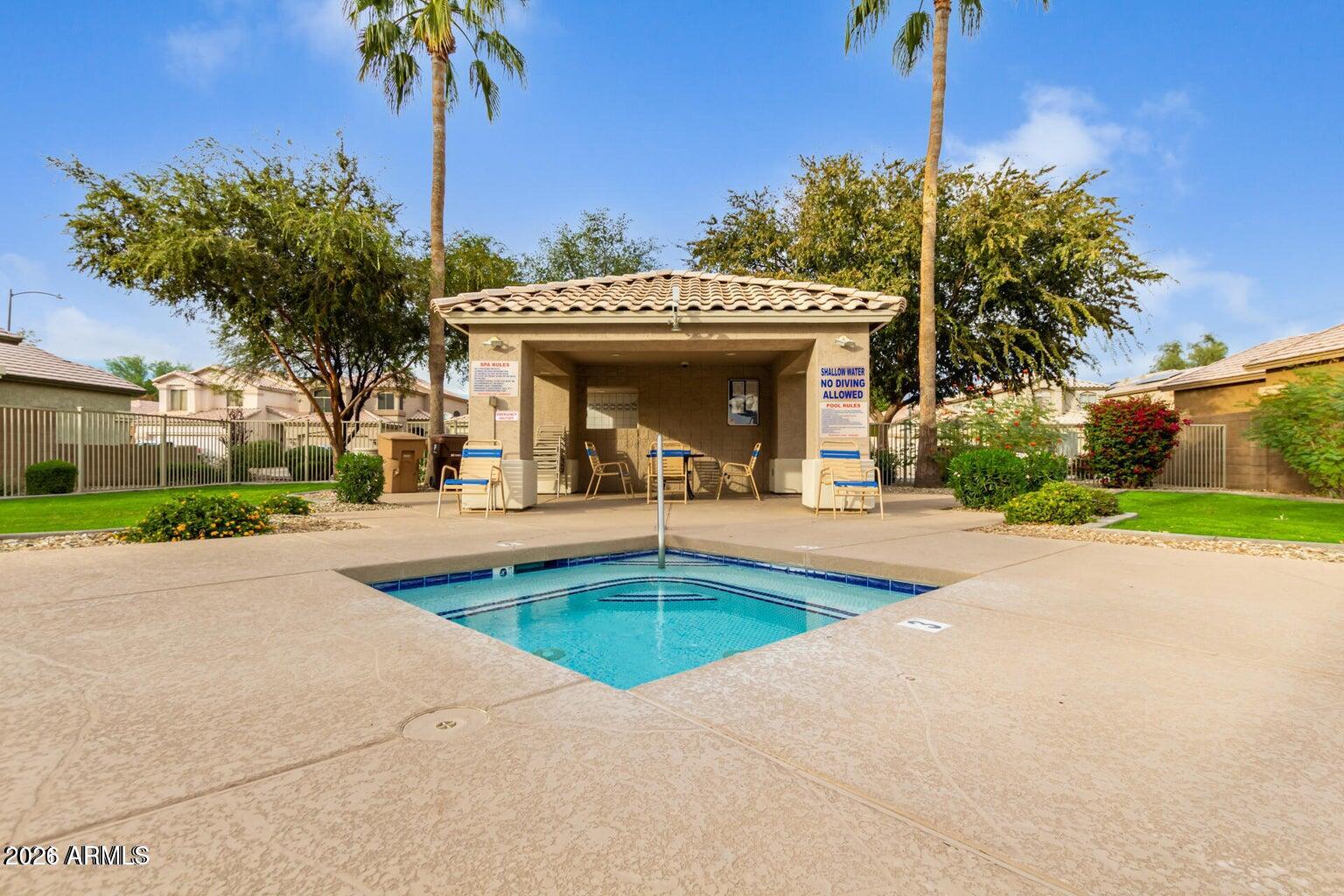 Enjoy the comfort and convenience of gated-community living with access to a refreshing community pool, and nearby schools. This inviting 3-bedroom home offers a functional layout, generous living spaces, and a 2-car garage. Inside, vaulted ceilings and abundant natural light create an open, spacious feel throughout the living room and great room. The kitchen features stainless steel appliances, granite tile countertops, abundant white cabinetry, and a two-tier breakfast bar ideal for casual dining and entertaining. Upstairs, double doors open to the spacious primary suite, complete with a sitting area, two walk-in closets, and a private bathroom. A covered backyard patio provides a relaxing place to unwind. Come experience the home, amenities, and lifestyle this Peoria community has.