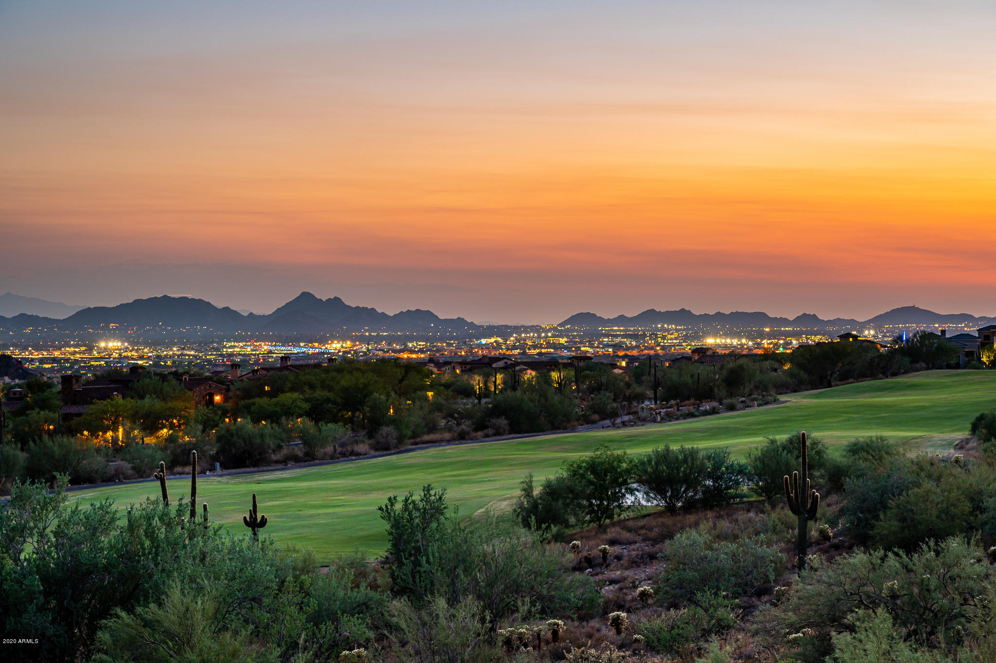 PREMIUM Horseshoe Canyon estate lot 2402 - one of the most dramatic and desirable custom homesites in the Silverleaf community.  Located above the 14th green of the Silverleaf golf course.  Stunning, unobstructed views of three golf holes, Camelback Mountain, and city light views.  This estate lot offers a large 48,186 sq ft building envelope and a total lot area of 2.1 acres all within close proximity to the Silverleaf Club and Spa.