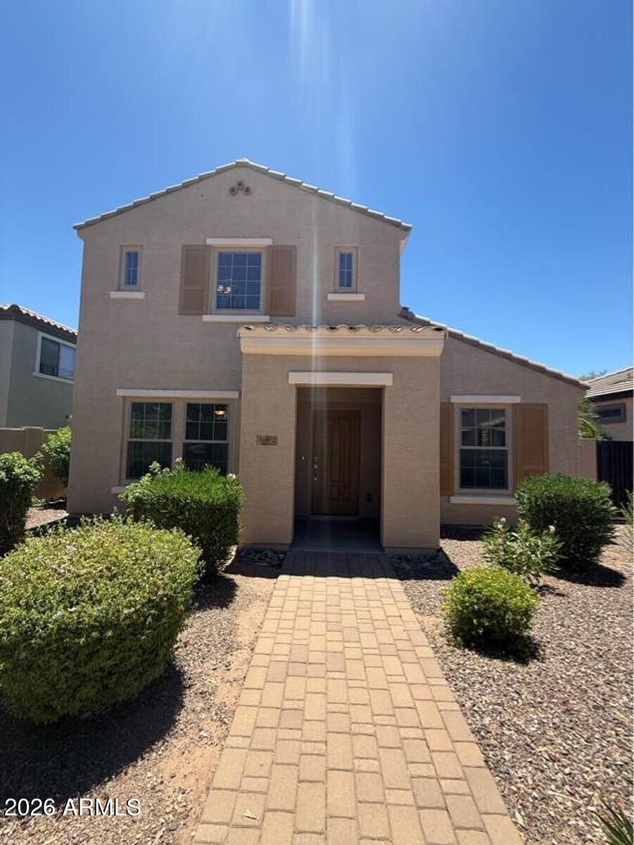 This move-in-ready home is nestled in the highly desirable master-planned community of Lyons Gate in Gilbert. Featuring a freshly painted interior and brand-new carpet throughout, as well as a newly painted exterior in 2024.  The downstairs boasts a bright, open-concept living area that flows seamlessly into a spacious eat-in kitchen complete with all appliances. Upstairs, you will find two bedrooms, two bathrooms, and a versatile loft area that serves as the perfect space for a home office nitch. Outside, the home features a cute, low-maintenance side yard, while the HOA takes care of all front yard landscaping for ultimate convenience. Living here grants you access to three sparkling community pools, endless playgrounds equipped with picnic areas and grills, and countless lush greenbelts winding throughout the neighborhood. This home offers incredibly quick access to the Loop 202, local grocery stores, and excellent dining, and is located less than two miles from the premier shopping and entertainment at SanTan Village Mall.
