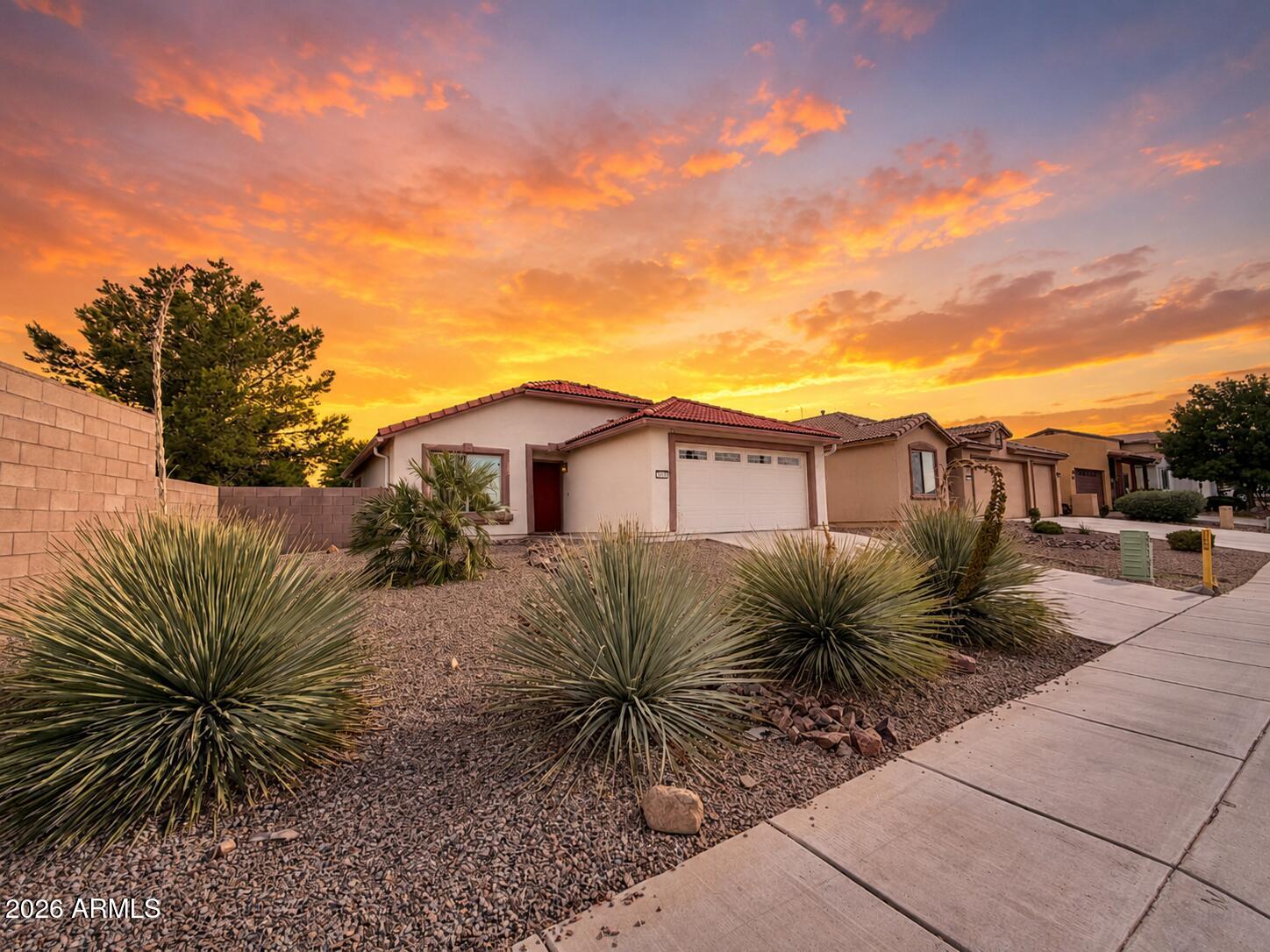 Welcome to this beautifully maintained home in Sierra Vista, where pride of ownership is evident throughout. Freshly painted inside, this move-in-ready property offers a bright, clean feel with timeless finishes. The spacious kitchen features elegant granite countertops, which continue throughout the home to create a cohesive and upscale look. A water softener adds everyday convenience, while the attached two-car garage provides ample space for parking and storage. With its thoughtful updates, low-maintenance appeal, and exceptional care, this home is ready for its next owner to move in and enjoy. Conveniently in a great location near shopping, dining, schools, and Fort Huachuca, this is an opportunity you won't want to miss.