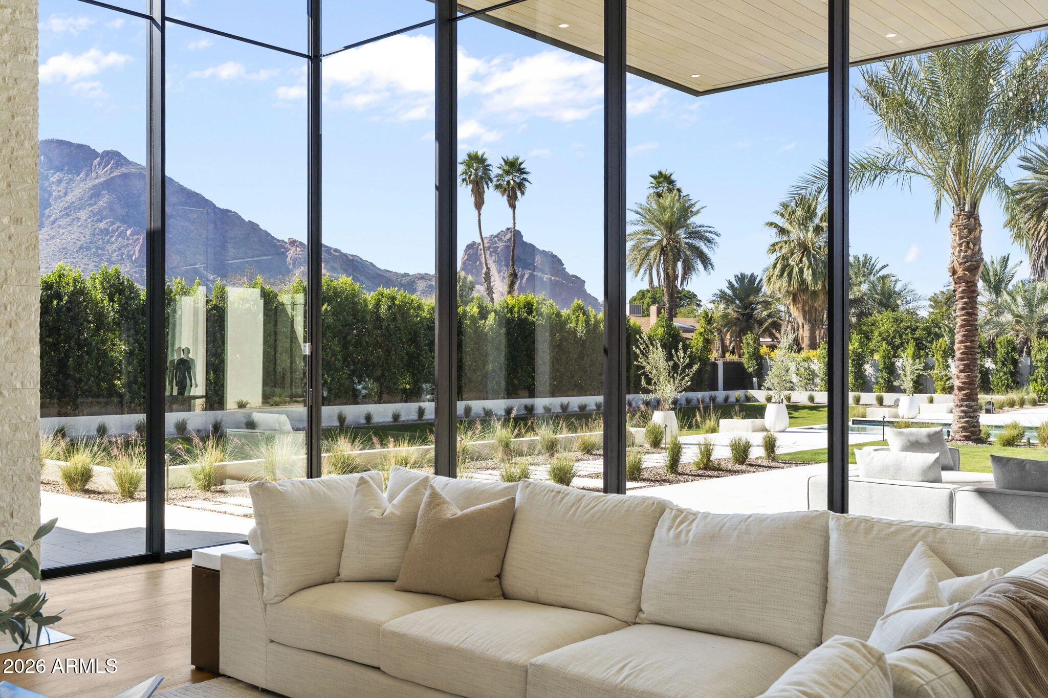 Experience stately views from this timeless Brand New Estate in one of the most desired neighborhoods in Paradise Valley with BIG VIEWS from every room.

The Great Room opens to epic views of Camelback Mountain, with 18ft tall motorized pocketing doors to match the impressive ceilings, seamlessly blending indoor & outdoor living. 

The custom Kitchen, full Catering Kitchen, double islands, & indoor/outdoor Bar continue into the Dining Room with custom refrigerated Wine Cellar & Game Room. 

The Primary Suite is well appointed with amenities and 2 outdoor retreats...A nearby suite for Gym or Flex Space and a split floorplan with 3 Junior Suites around a Den plus a full Detached Guest Home.  

The quality of finishes is unsurpassed!