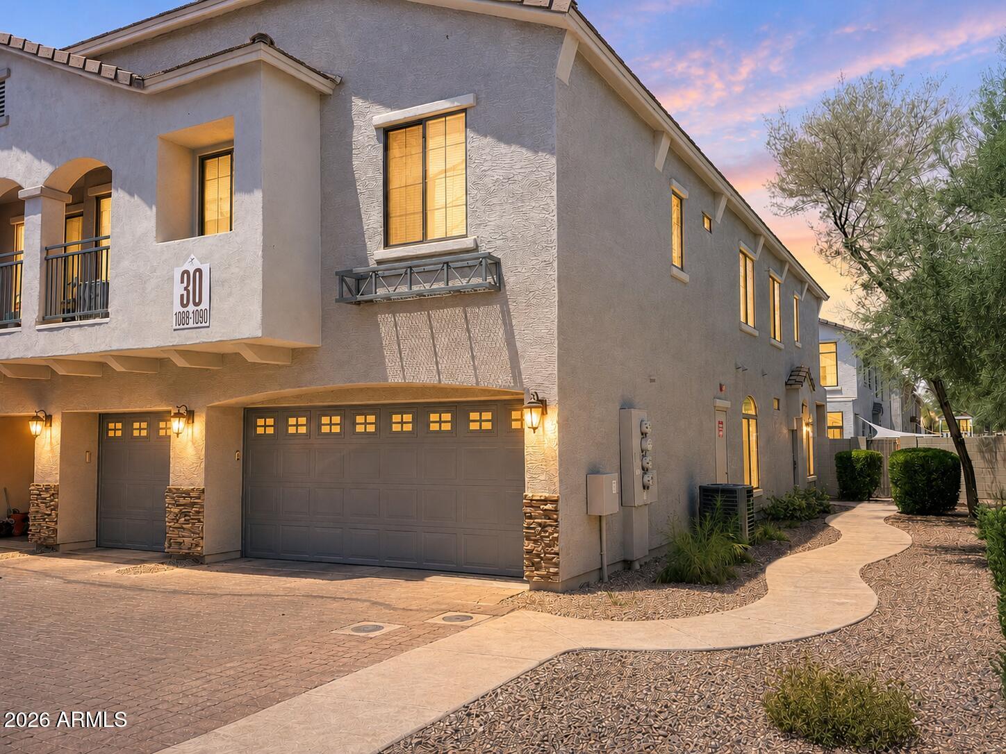 FRESHLY PAINTED | GATED COMMUNITY | 3 BEDROOMS | PRIVATE BACKYARD | 
This 2-story townhome offers one of the largest backyards in the community, creating a rare combination of indoor comfort and outdoor space. Upstairs, all three bedrooms feature vaulted ceilings, including the primary suite with its own full bathroom, while a second full bath serves the additional bedrooms. Downstairs, the spacious living room opens through a sliding glass door to a covered patio and private backyard with brand-new desert landscaping. The fully equipped kitchen includes stainless steel appliances and connects to a separate dining area, making the layout functional for both everyday living and entertaining. Brand-new carpet throughout gives the home a fresh, move-in-ready feel. An attached 2-car garage an abundant guest parking throughout the community add everyday convenience. Residents enjoy access to a gated community with a pool, dog park, and well-maintained common areas, all in a location designed for easy living.