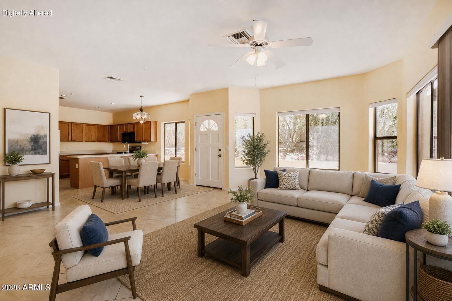 Great opportunity to own a move-in ready, updated townhome! New carpet, interior paint, lighting, blinds, some plumbing fixtures & Whirlpool stainless steel side-by-side refrigerator/freezer & glass-top range. Main floor with 18'' diagonal floor tile contains a spacious open great room/kitchen, laundry, 1/2 bath & covered patio. Staircase with practical wood flooring leads to upper level with its master suite & balcony, 2 guest bedrooms & guest bath. New upper level carpet makes for quiet downstairs living. Mountain Views! Attached 2 car garage has direct entry with no steps into home. Sparkling community pool, built-in BBQ & exterior fireplace. Walk to dining & Desert Vista, Dog & Skate Parks. Pets limited to 1 and not to exceed 20lbs.
