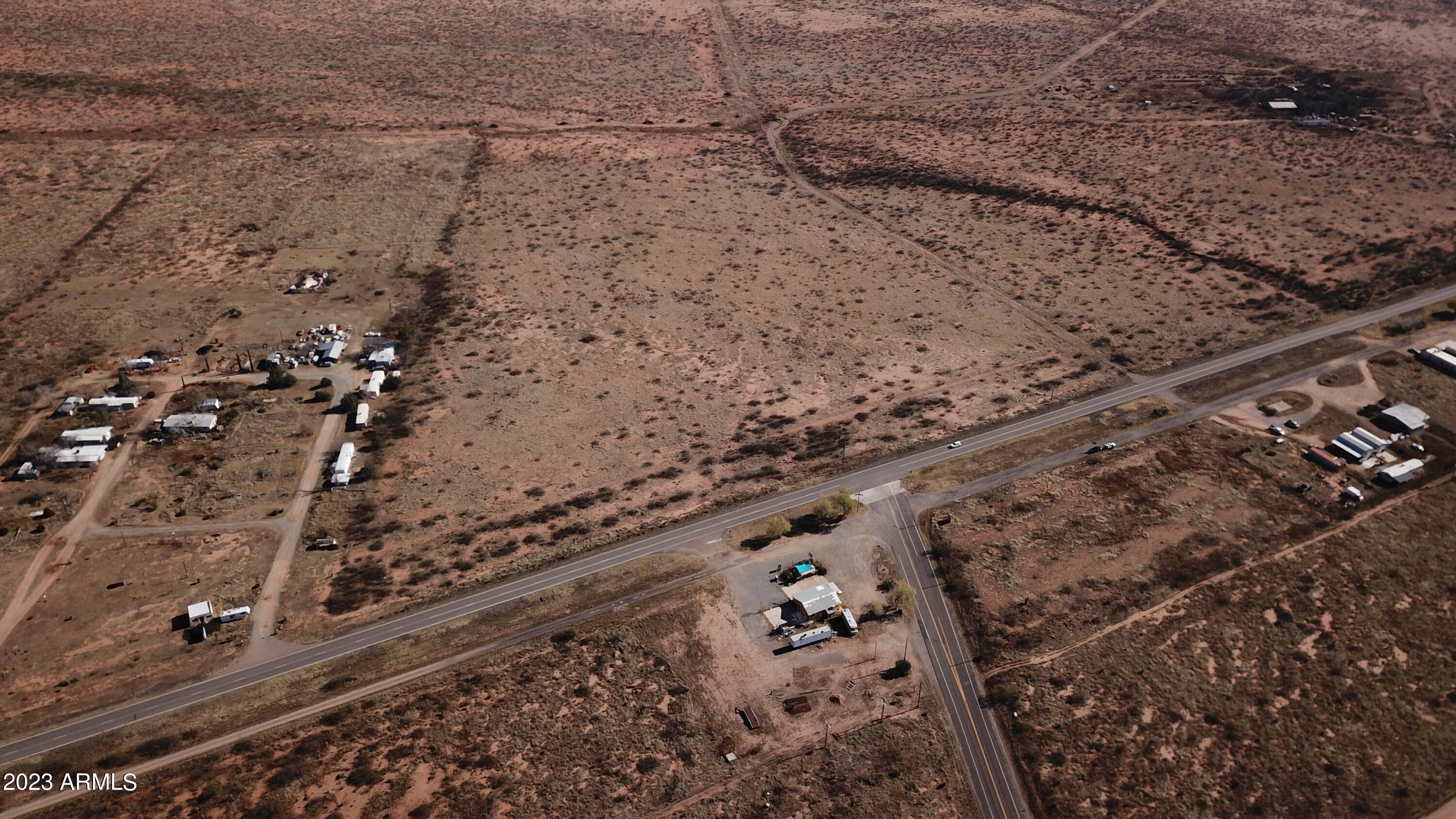 This combined 22.5 AC Parcel is a unique BUSINESS OPPORTUNITY IN A FANTASTIC LOCATION offering 716' of Hwy 191 FRONTAGE at the intersection of Ironwood Rd which is THE ENTRANCE TO COCHISE STRONGHOLD. The Ghost Town Trail runs directly south out of Pearce to Gleeson and other nearby historic sites. Lots of traffic to nearby vineyards and other points of interest. Enjoy the views of the Chiricahua Mountains. Lots of POTENTIAL!  Ideal property for COMMERCIAL DEVELOPMENT for Gas Station-Restaurant-Motel-Retail Shops! This listing is inclusive of 2 Parcels: 114-11-005A (7.5AC) and 114-11-005B (15AC). Parcels may be sold separately.