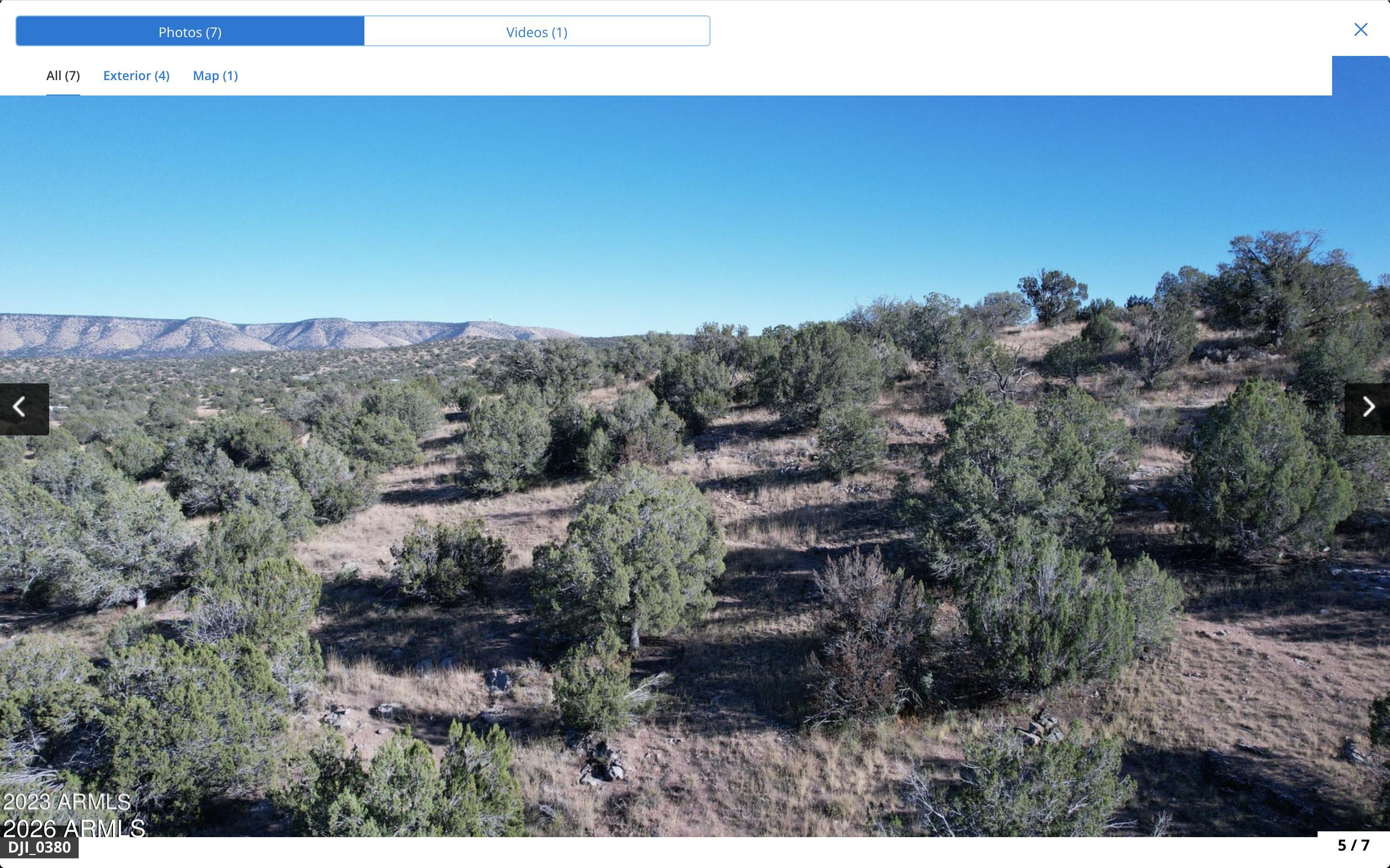 1.30 acre lot with new septic, gentle slope  mountain property, good amount of trees, and serene atmosphere, great start to build your dream homesite. 30 min from town. Mild Summers and Winters. 2.5 hrs to Vegas, Kingman is hour away toi Big Box Stores.
Recreational opportunities, quad riding, hiking trails, horseback riding, camping, plenty of open space for gardens, animals. Embrace the beauty of nature creating a sense of serenity. Whether you dream of a mountain escape, or a home with your furry friends, this property offers endless potential.