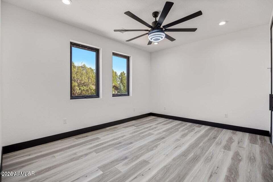Brand new modern villa in the highly sought after The Retreat at Bison subdivision! This beautifully built home features stunning included appliances, quartz countertops, a farmhouse sink, tiled showers, sleek modern fixtures, and a spacious primary suite with dual vanity. The open living area is highlighted by a contemporary fireplace, creating the perfect blend of comfort and style. Enjoy the covered Trex back deck for year round outdoor living, plus the convenience of a detached garage. Modern mountain living at its finest!