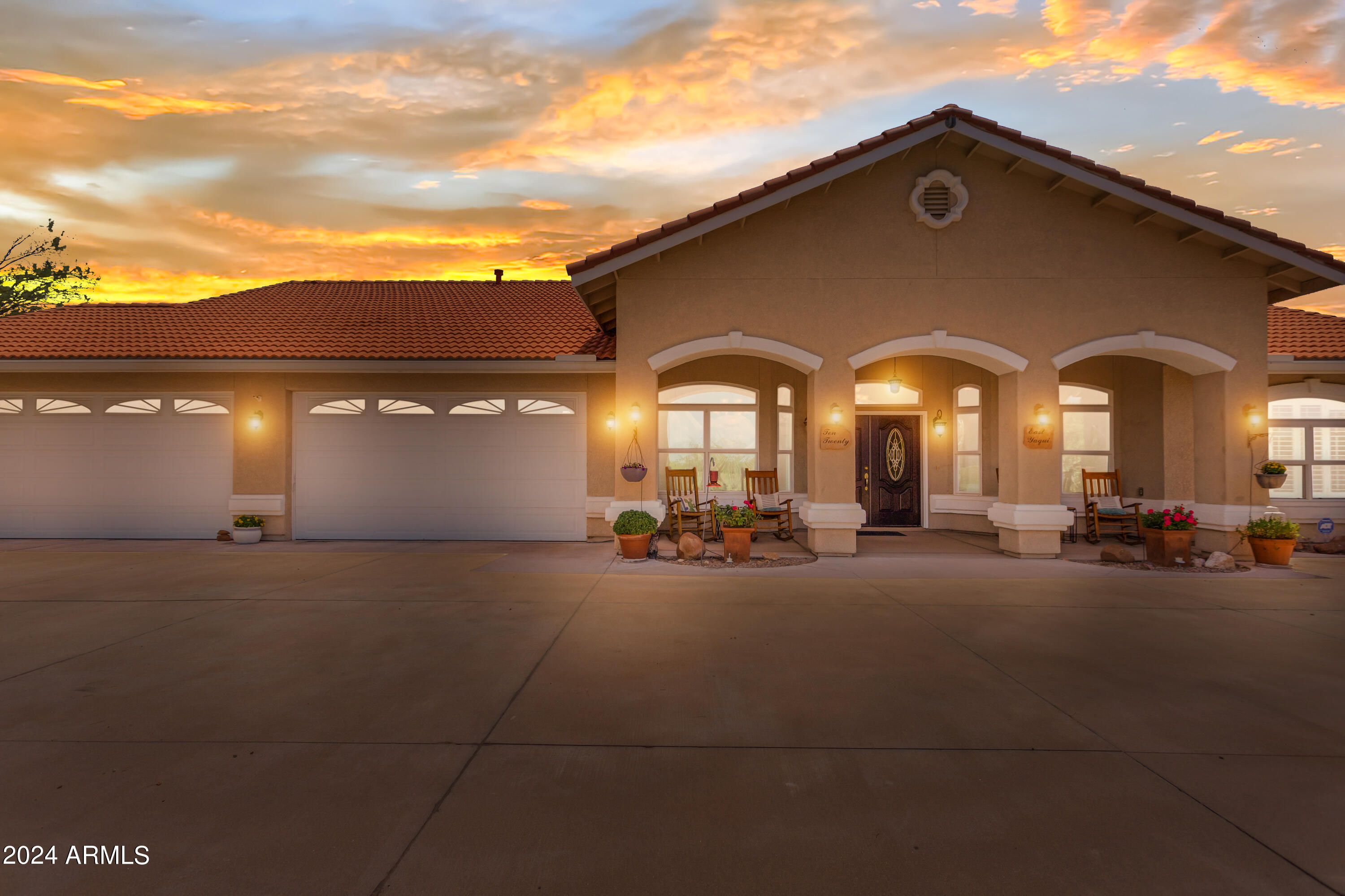 Experience luxury living with spectacular views in this stunning custom home! This split floor plan offers 3 bedrooms, 2 baths, and a den/office, with new tile installed throughout. The open-concept kitchen is a cook's dream, featuring granite countertops, a gas range with a pot filler, a wine cooler, beveled glass in the cabinets, a giant Subzero refrigerator, and a walk-in pantry. The kitchen also includes pull-outs in every cabinet, making it both functional and stylish. Adjacent to the kitchen are a separate formal dining area and a breakfast nook, providing multiple dining options.

All rooms have ceiling fans for added comfort. The custom Arizona room, designed as part of the home, provides a spacious area with fans, perfect for enjoying morning coffee and relaxation.

The primary bedroom features direct access to the patio/Arizona room, enhancing the connection between indoor and outdoor living. The master bath is designed for ultimate comfort, with a heated jet tub, a walk-in shower, granite countertops, double sinks, and a spacious walk-in closet.

The laundry room has ample storage and a utility sink for added convenience. Additionally, the home includes a gas dryer for efficient laundry care.

Additional features include a hot water recirculation pump, surround sound, alarm system, low-E windows with custom finishes, and natural gas. The office/den has exterior access.

Step outside to your own private oasis! The backyard features a stunning solar-heated in-ground pool, heat-resistant travertine decking, and a beautiful waterfall. The gazebo offers a perfect spot to relax and enjoy the breathtaking mountain views, making this outdoor space ideal for entertaining or unwinding after a long day.

The oversized 4-car garage is 25' deep and includes a workspace, providing ample space for vehicles and projects. The property also includes an electrified shed, perfect for storage or hobbies.