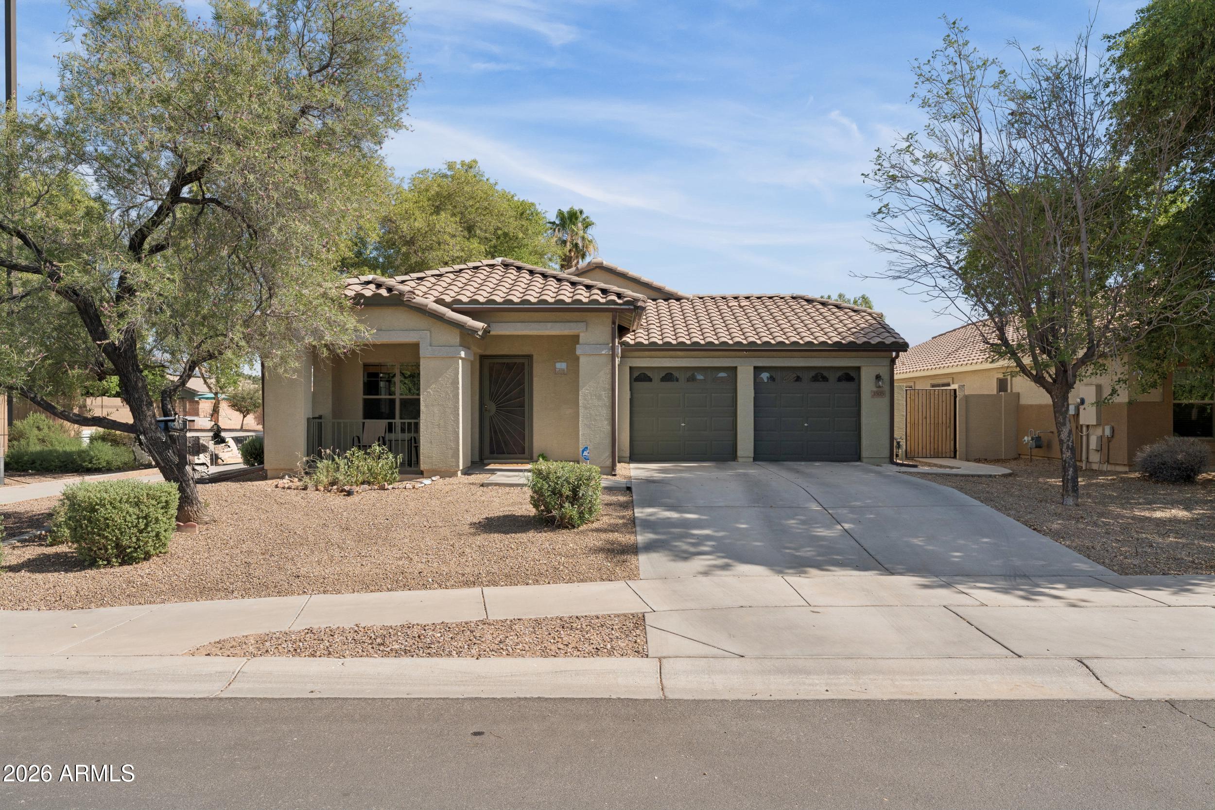 Welcome to Gilbert's Chandler Ginning community, near Higley and Pecos, where daily life feels easy because so much is close by. This single level 3 bedroom, 2 bathroom home sits in one of Gilbert's most convenient pockets with quick access to SanTan Village, Agritopia's Epicenter, parks, dining, shopping, recreation, and everyday essentials. The home is positioned on a desirable corner lot with north/south exposure, a 2 car garage, mature trees, desert style front landscaping, and a spacious covered back patio.

Inside, the home has been refreshed with all new custom interior paint, updated laminate wood flooring in the main living areas, new granite counters in the kitchen, black appliances, and more, giving the space a clean and current feel throughout.throughout. The floor plan features vaulted ceilings, a welcoming living area, and a family room with a gas fireplace. The kitchen offers recessed lighting, pantry storage, replaced sink, faucet, dishwasher, stove, updated plumbing, and plenty of functional cabinet and counter space.

The primary suite is light and bright with views of the back yard, a walk-in closet, dual sinks, a separate soaking tub, and private toilet room.

Beyond the cosmetic updates, the home also offers thoughtful functional improvements including plumbing updates, water heater and water softener maintenance, roof work, drainage improvements, repaired gates and fencing, updated locks, and a side dog run with a dog door. The single level layout, no interior steps, open living spaces, and easy indoor-outdoor flow make the home feel comfortable and practical for everyday living.

The backyard adds even more to love with lush grass, many mature fruit trees and room to enjoy outdoor living. The community also offers access to biking and walking paths, plus a children's playground right across the street.

The location is a major standout. Spend the day shopping or dining at SanTan Village, meet friends for coffee, dinner, or a local event at Agritopia's Epicenter, enjoy nearby parks and walking paths, or take advantage of quick access to the growing southeast Gilbert corridor. From restaurants and retail to recreation, schools, commuter routes, and daily conveniences, this home keeps you connected to the places people love most about Gilbert while still offering the comfort of an established neighborhood setting.

This is a refreshed Gilbert home with meaningful updates already done, a desirable single level layout, a corner lot, mature fruit trees, and a location that keeps you close to the best of Gilbert.