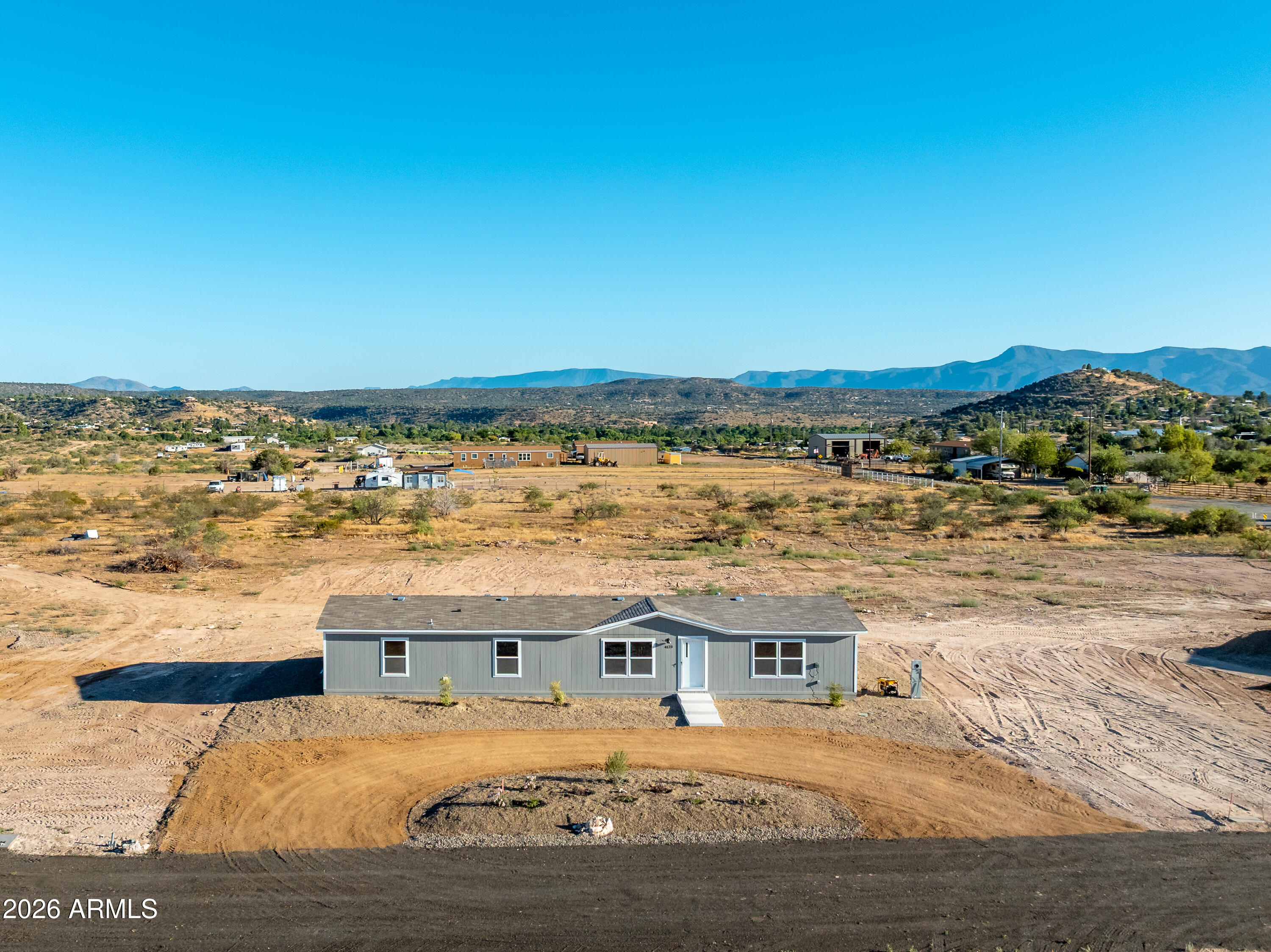 Welcome home to this pristine, never-lived-in 2026 Clayton manufactured home, featuring the highly sought-after and spacious floor plan. Situated on a flat, usable one-acre lot with no HOA, this property offers the ultimate freedom, privacy, and room to grow in the heart of the Verde Valley.
1,805 square feet, this thoughtfully designed double-wide boasts a bright, open-concept living space perfect for modern living. The expansive layout includes 4 generously sized bedrooms and 2 full bathrooms, providing ample space for family, guests, or a dedicated home office.
One of the standout features of this property is its private well, offering self-reliance and peace of mind. Location is everything, and this home delivers. Enjoy central access and an easy, scenic commute to Sedona! Whether you're looking for room to park your toys, build a workshop, or simply enjoy quiet starry nights, this Verde Valley property is the one!