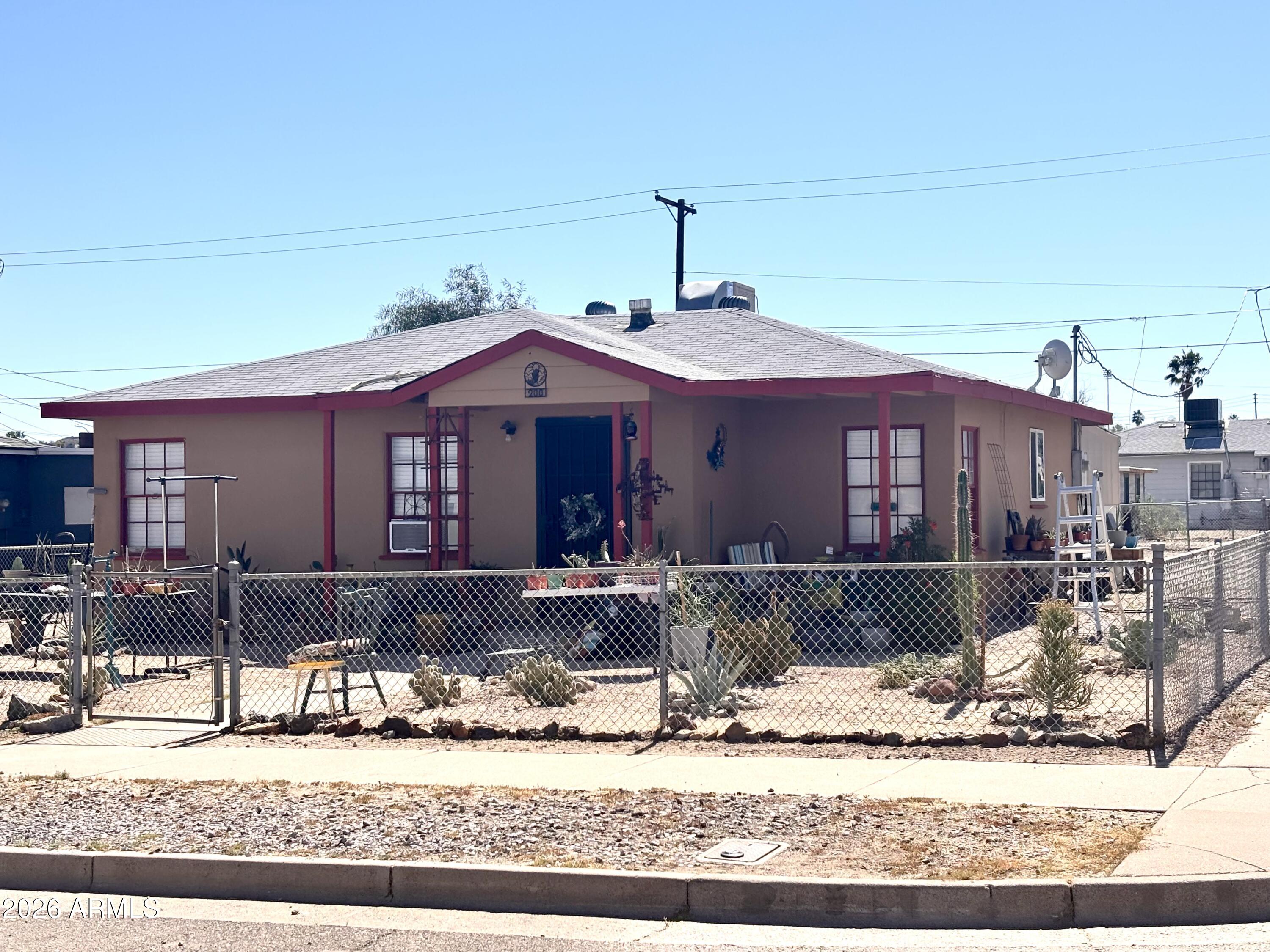Opportunity knocks in East Ajo, within walking distance to the downtown plaza, Ajo schools, and the pickleball courts. This 3-bedroom, 1-bath home features a partially updated interior with laminate flooring in the main living areas and vinyl in the bedrooms and kitchen. The bathroom has been refreshed with a new vanity, walk-in shower, and tiled walls, while the kitchen offers updated cabinetry and butcher block countertops. Much of the interior has been freshly painted.

Outside, enjoy a freshly painted stucco exterior, covered back patio, and a spacious backyard with a metal storage shed. The property also features an RV gate and additional parking, making it a great option for snowbirds or those traveling with an RV. A few finishing touches remain, offering a great opportunity